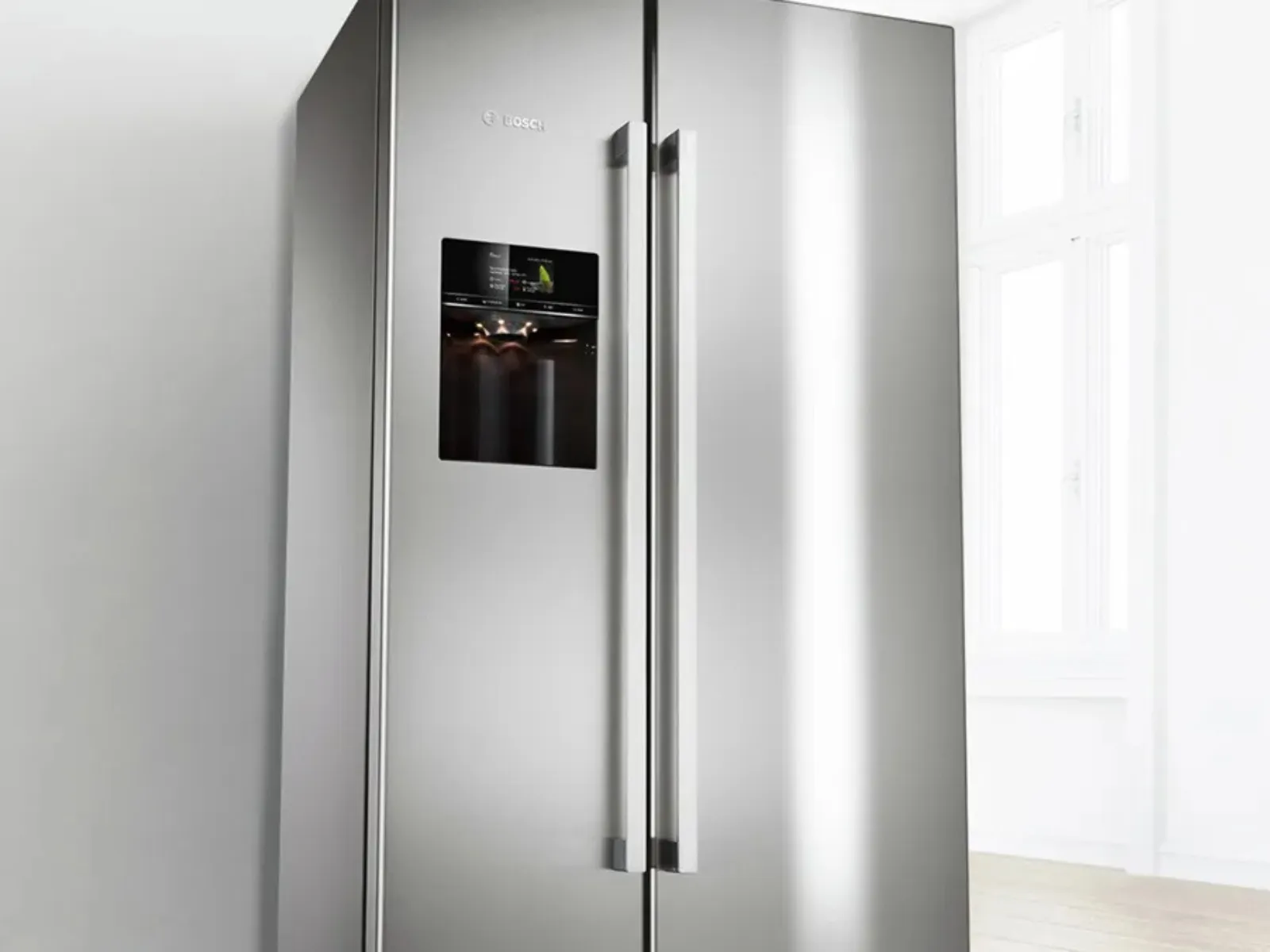 A closeup of an American side-by-side with an ice and water dispenser.