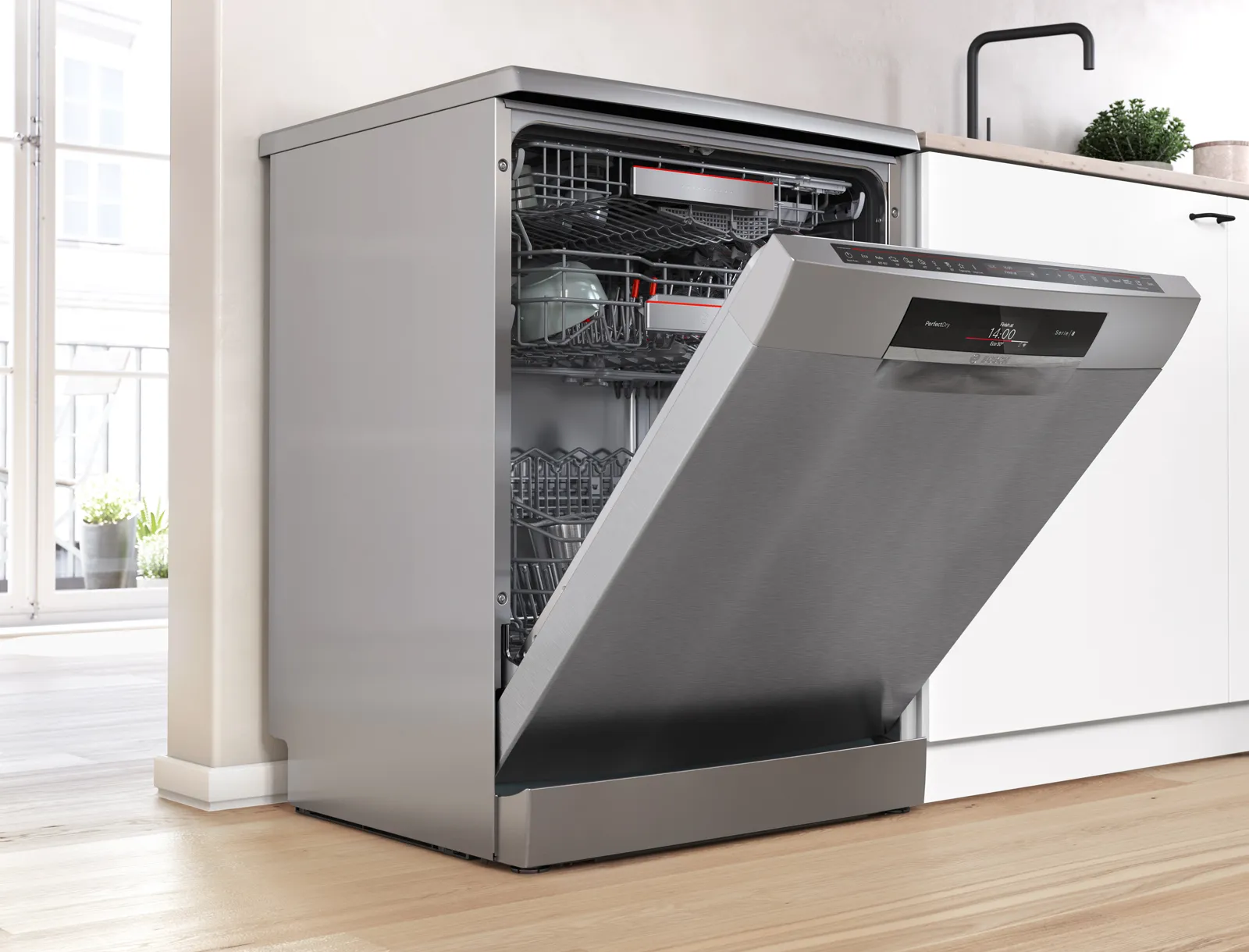 Freestanding dishwasher with open door in a kitchen