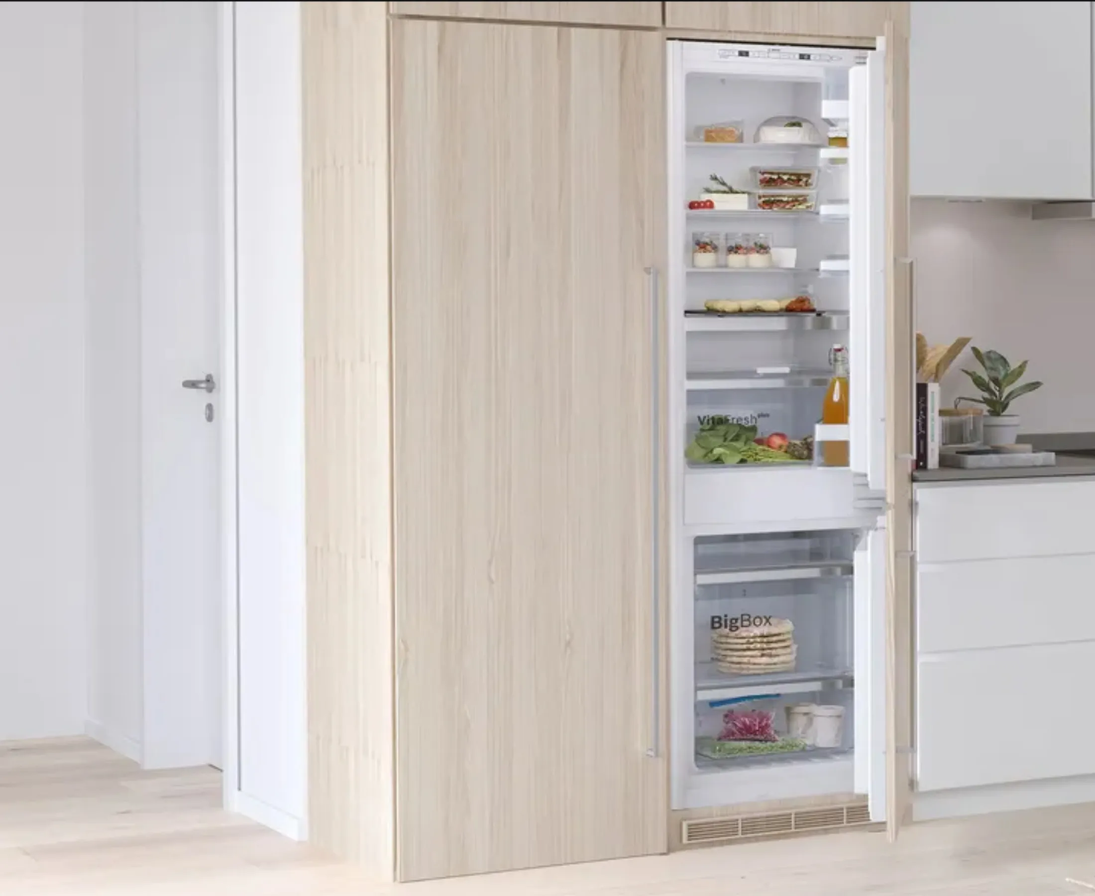 open fridge in scandinavian style kitchen