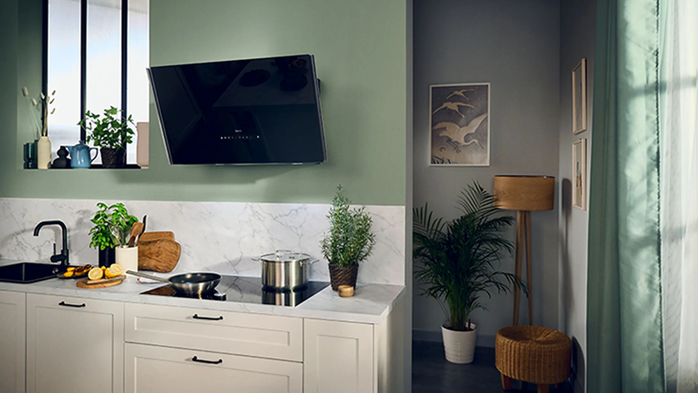 Kitchen interior with a green wall, white countertop, and an induction hob.