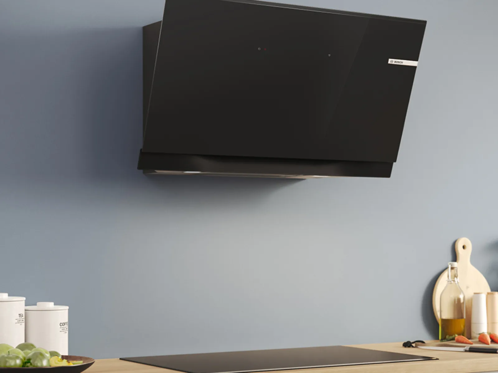 Bosch hood above a kitchen countertop against a grey wall