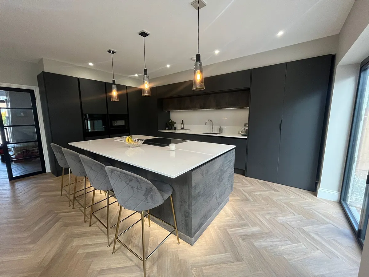 Brightly lit dark style Neff kitchen