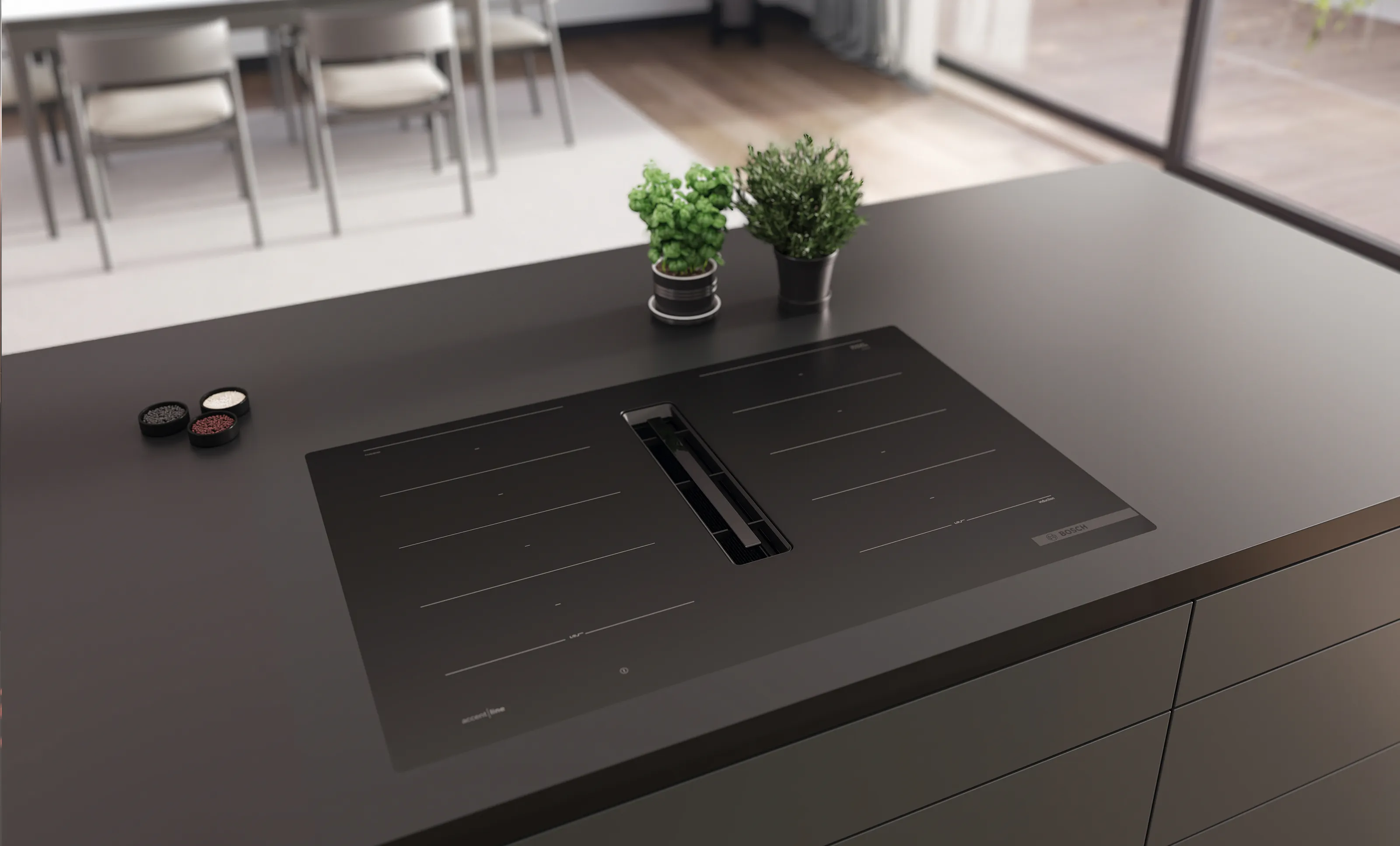 Top view of Bosch venting cooktop in carbon black matt design.