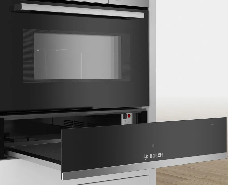 Bosch warming drawer open, under a built in oven.