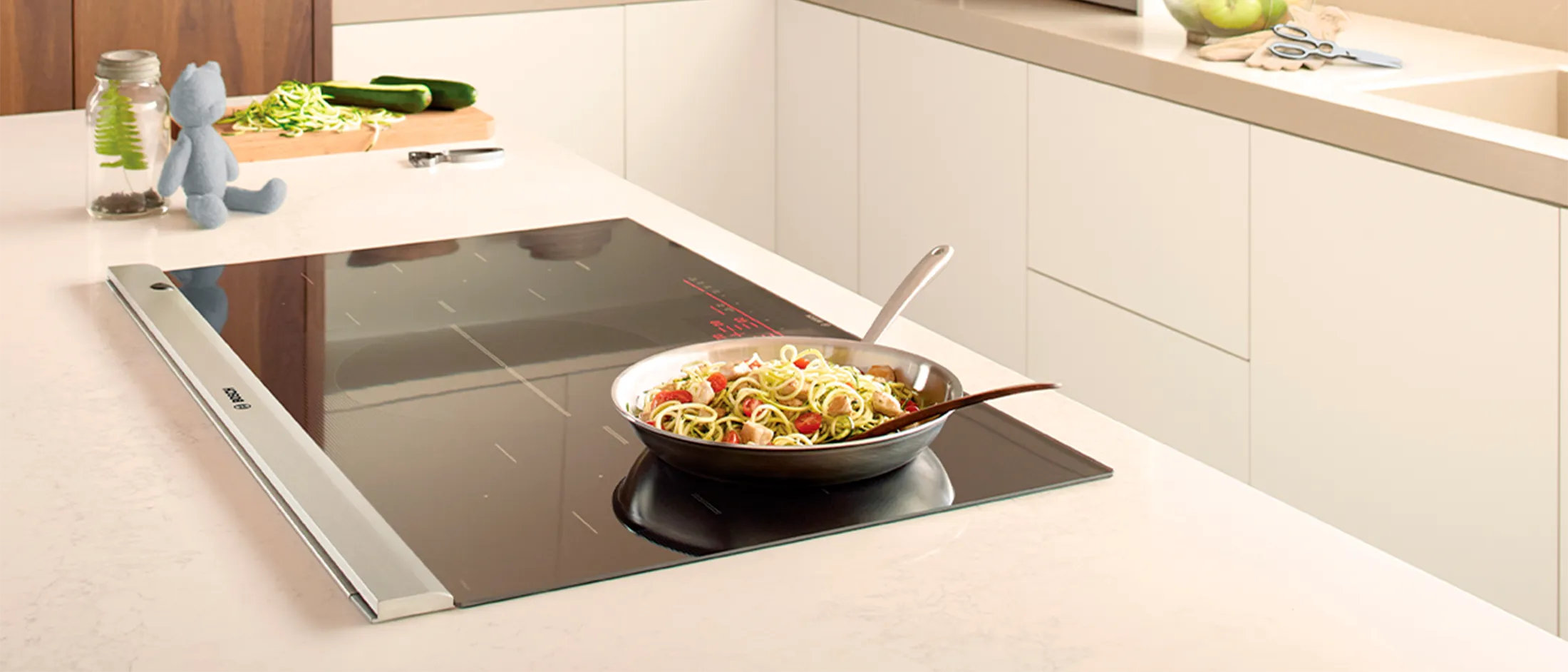 Modern kitchen with a Bosch induction cooktop.