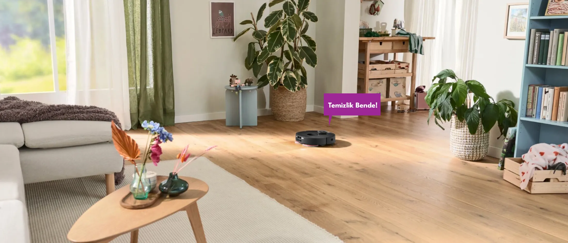 Spotless in a modern living room, speech bubble: "All set! Returning to my Dry-Wet Service Station.