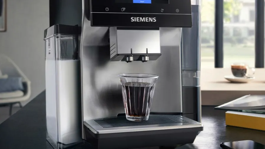 Siemens coffee machine with full mug underneath
