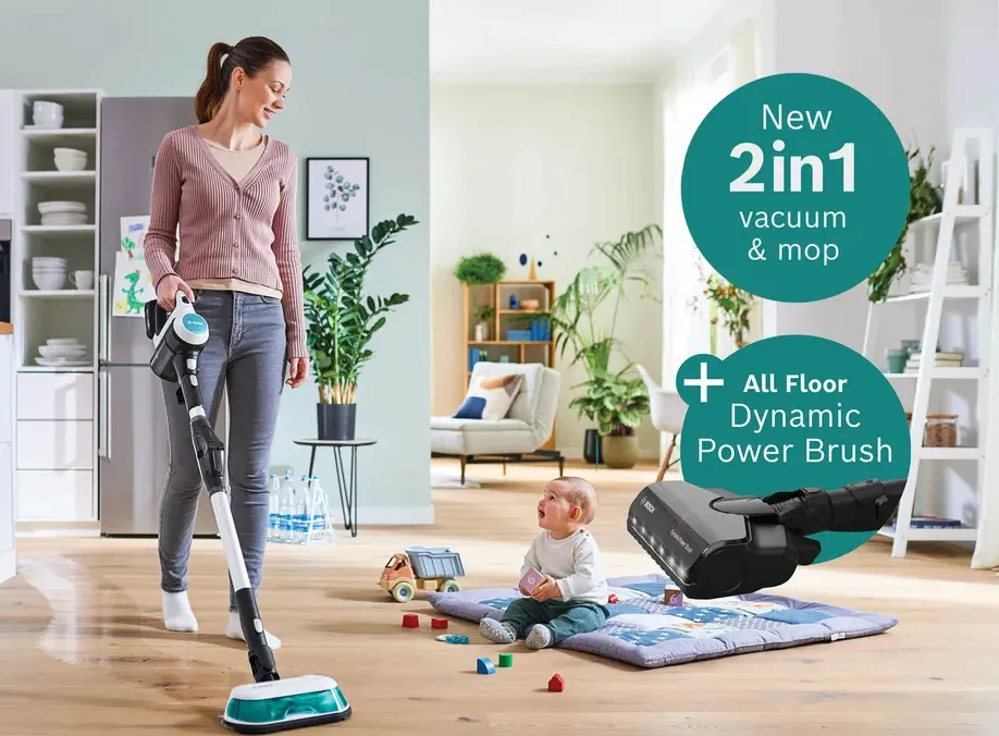  A wet & dry model vacuums an area rug.