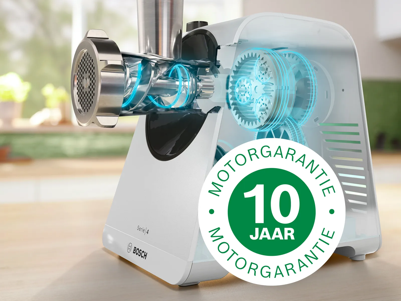 Witte Serie 4 voedselmolen met röntgenafbeelding van de binnenkant van de motor, naast het logo voor 10 jaar garantie.