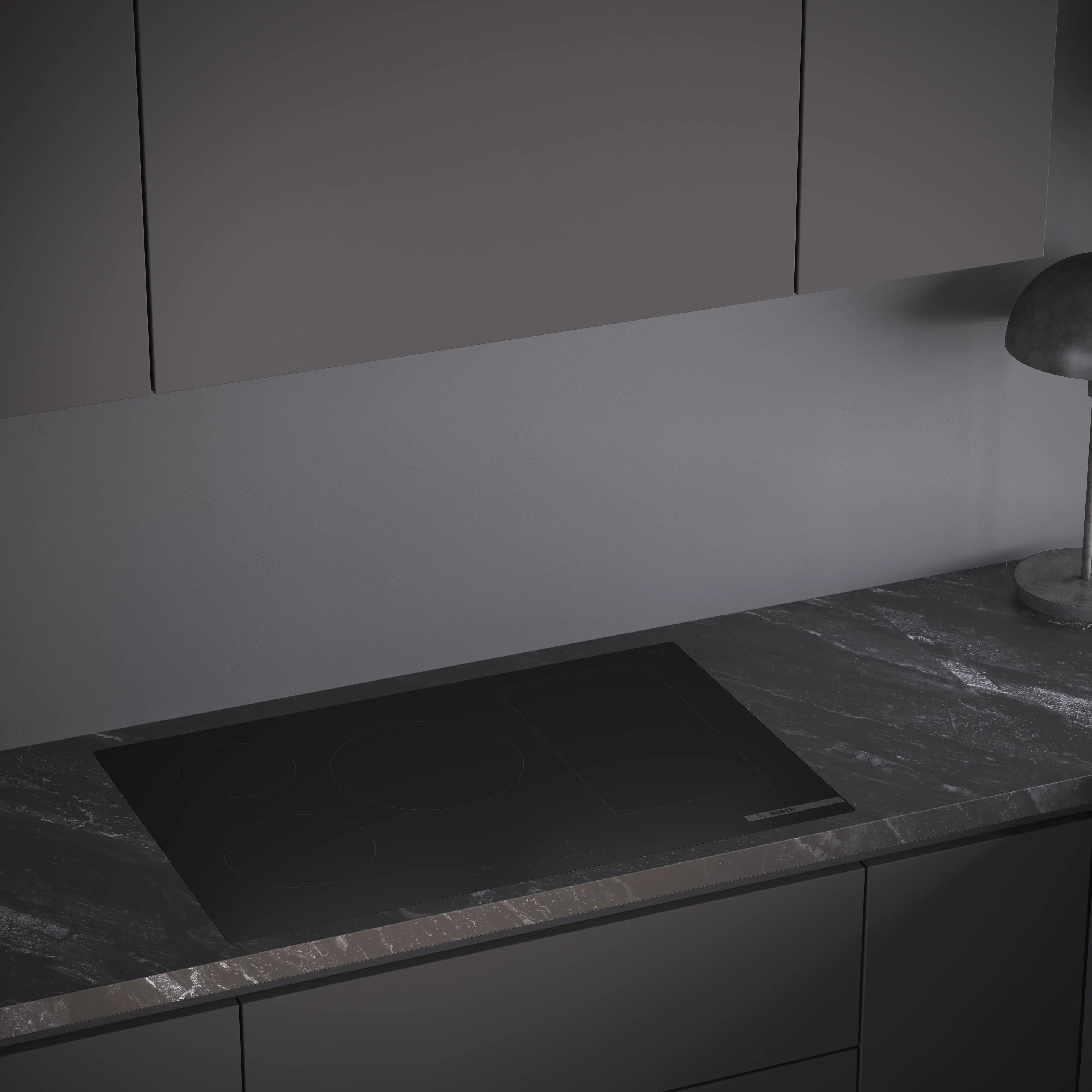 Moderna kuhinja crne boje s matt design Bosch indukcijsom pločom za kuhanje.