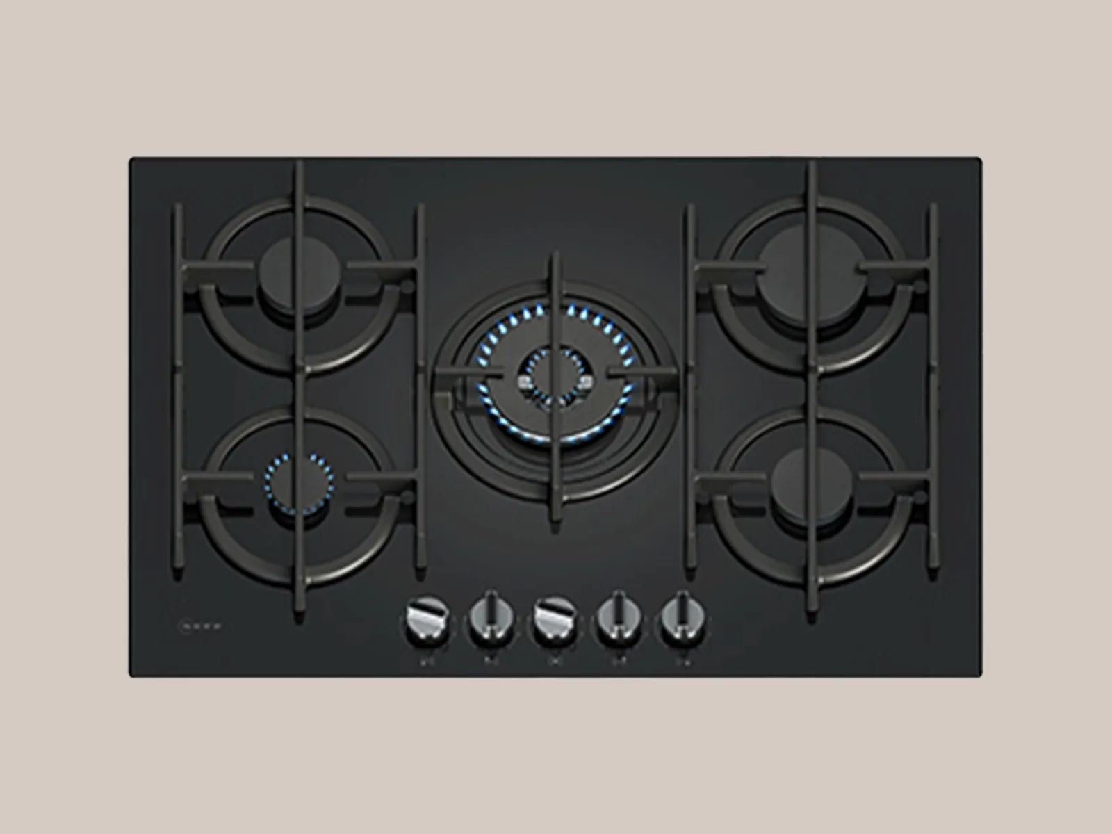 A modern black gas cooktop featuring four burners, including one with blue flames, and control knobs for temperature adjustment.