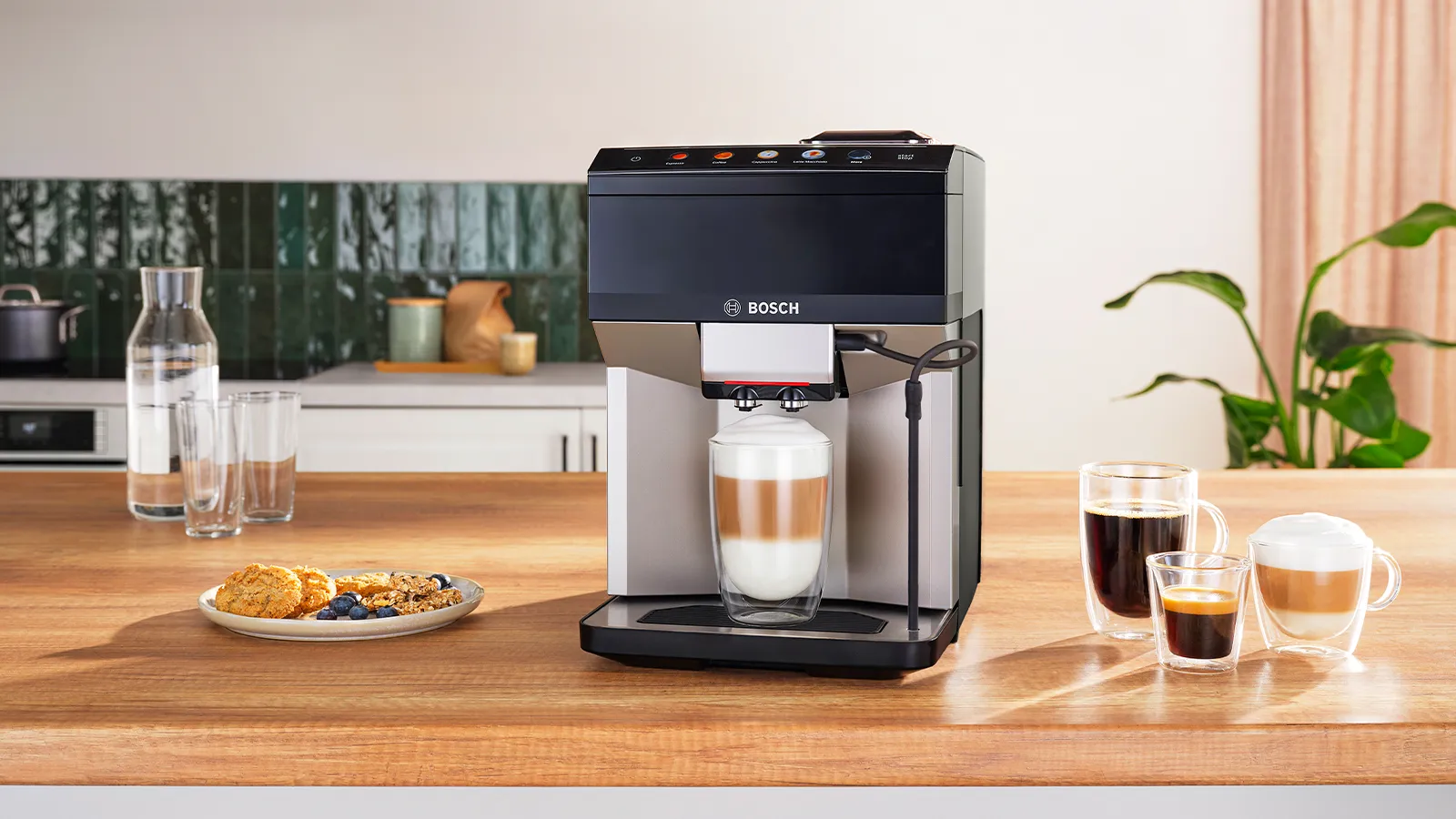 VeroCafe Bosch Espresso Machine onto of wooden countertop with coffee cups
