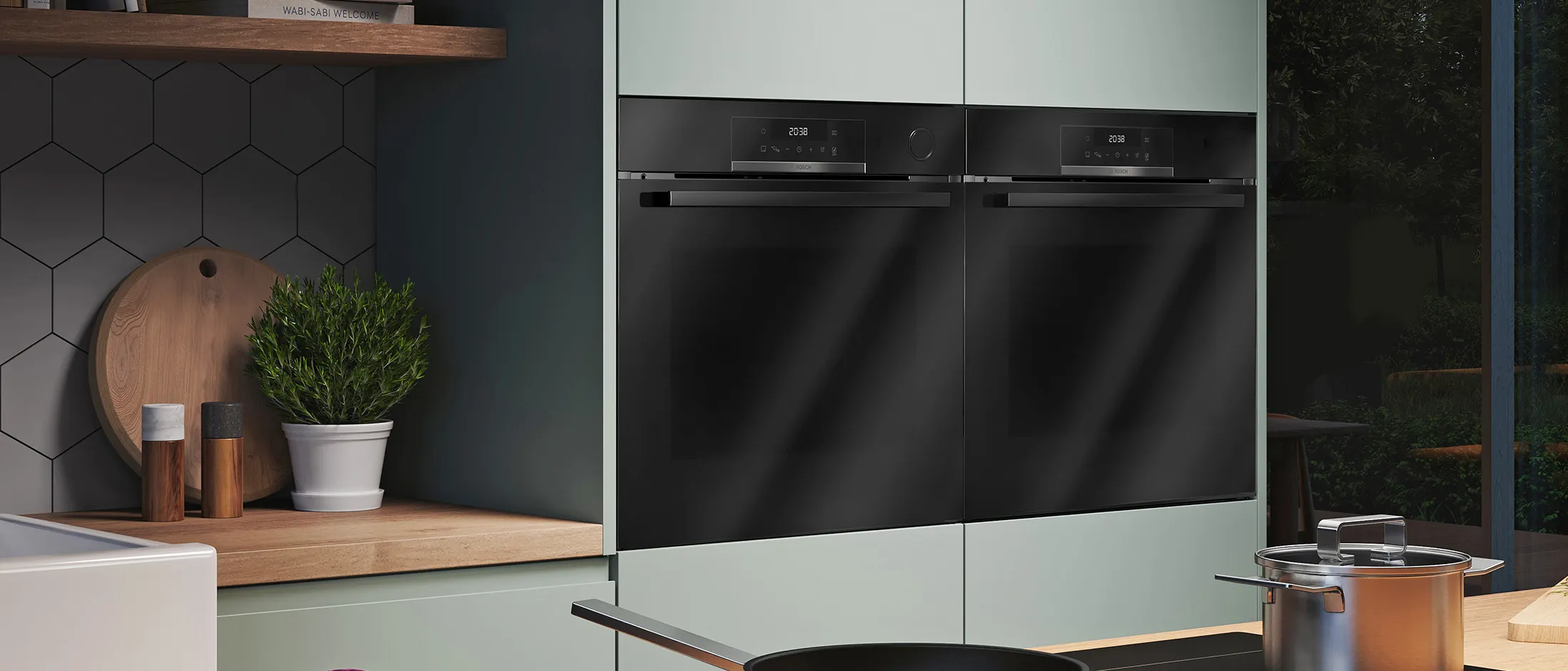 An oven and microwave in a modern living environment.