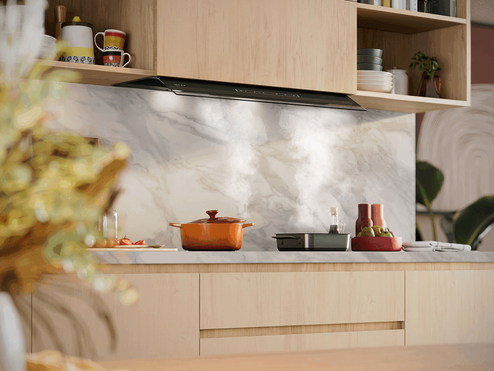 Modern kitchen scene featuring steaming pot and pan on a marble countertop with wooden cabinets and hidden cooker hood.