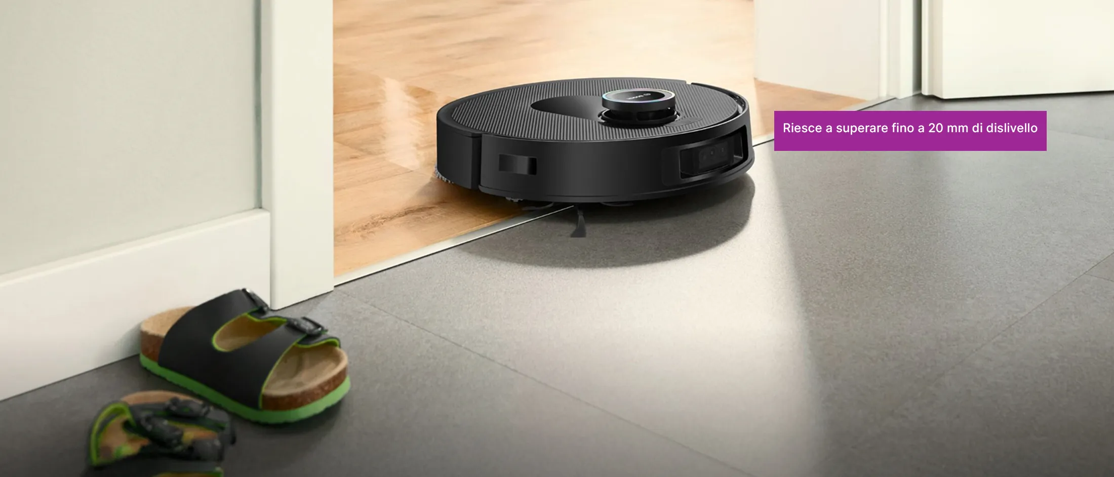 Spotless sulla soglia tra due stanze con diversi tipi di pavimento, annotato con le varie caratteristiche.