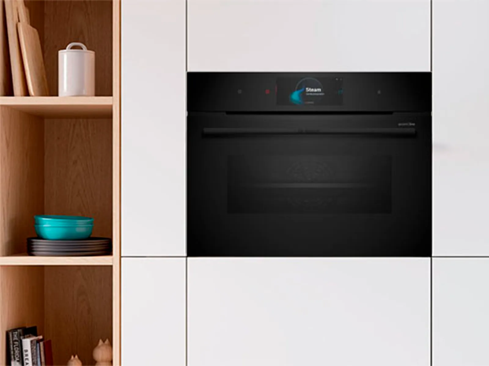 Forno compatto Bosch in un mobile moderno bianco e mensole con oggetti