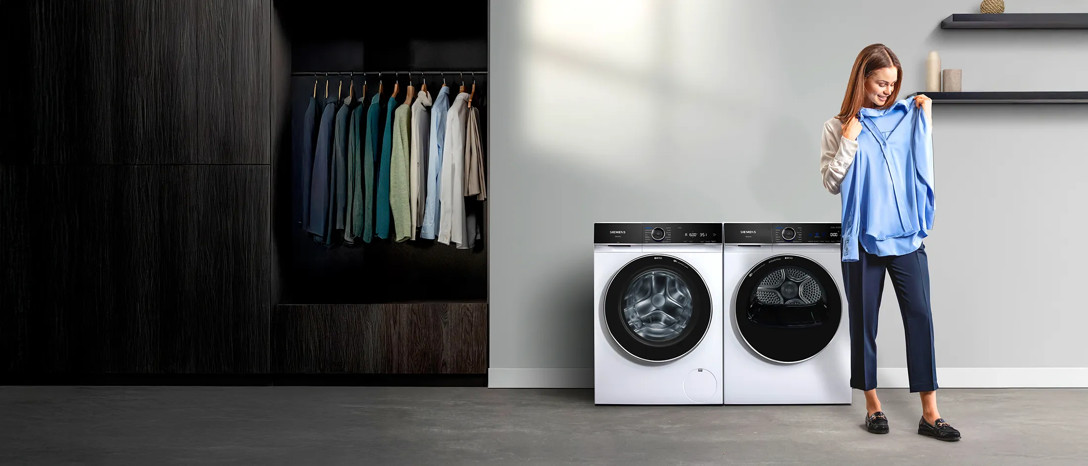 Nowoczesna pralka z ubraniami, zdobywająca nagrody Red Dot i iF Design w 2023 roku.