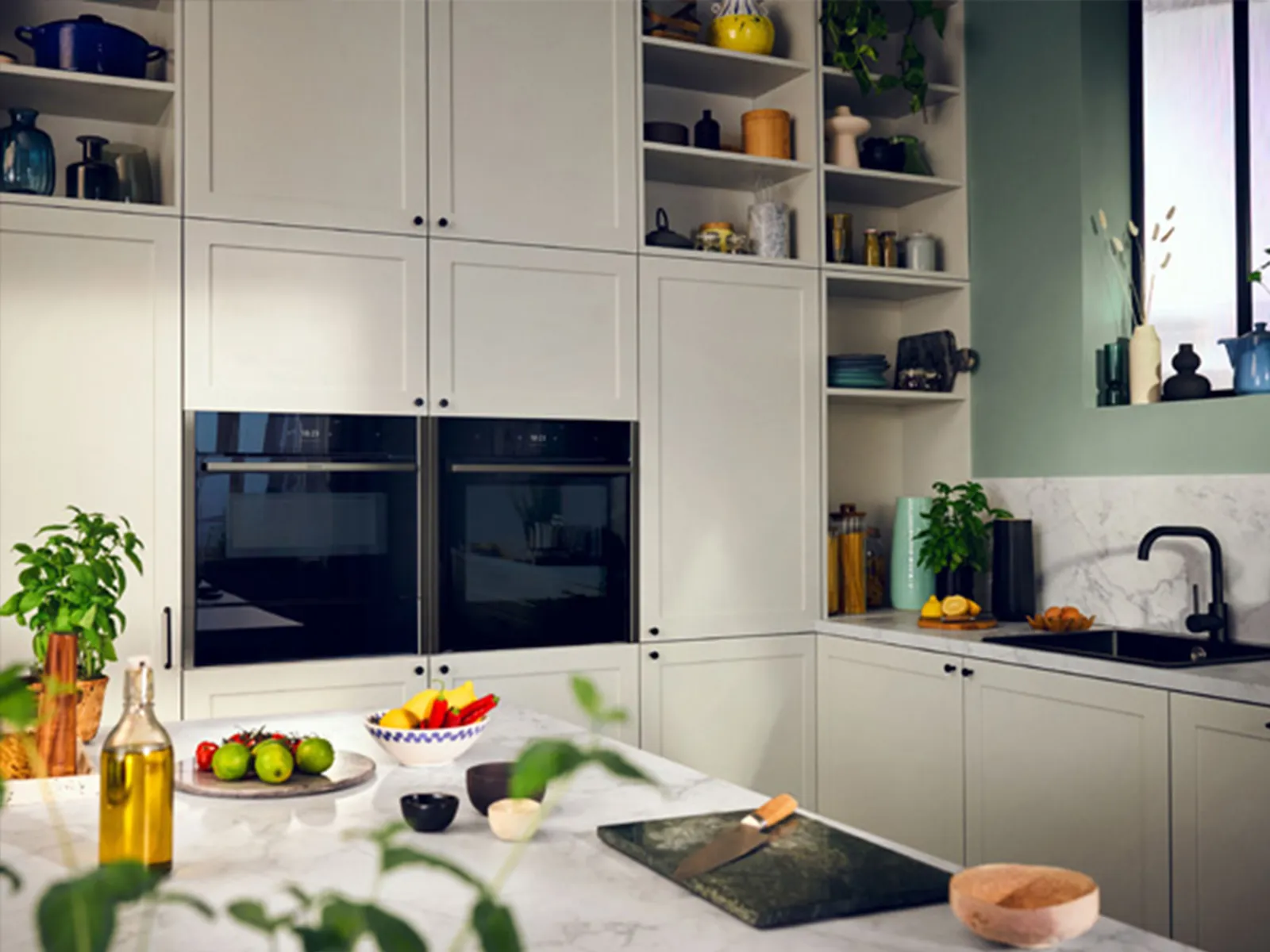 Warm, cozy kitchen with wooden cabinets, brick backsplash, and colorful decor elements.