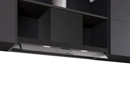 A modern black kitchen cabinet showcasing a sleek, under-cabinet range hood with integrated lights