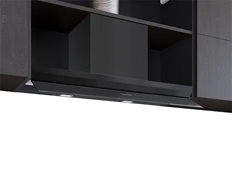 Sleek black kitchen hood installed in a dark wood cabinetry space, featuring built-in lights and a modern design