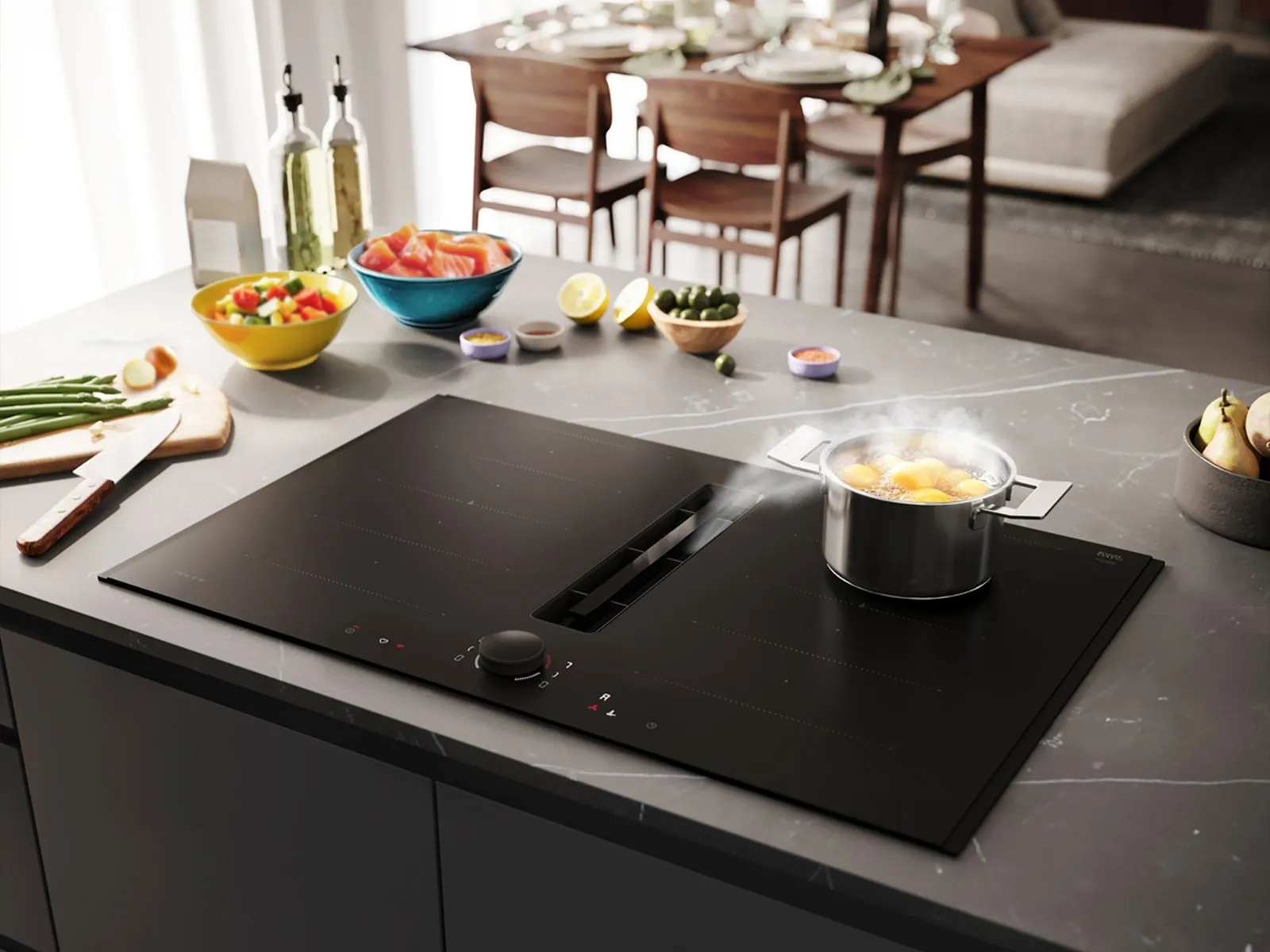 Ένας γκρί πάγκος κουζίνας, με εντοιχιζόμενη εστία με ενσωματομένο απορροφητήρα σε ματ μαύρο χρώμα.