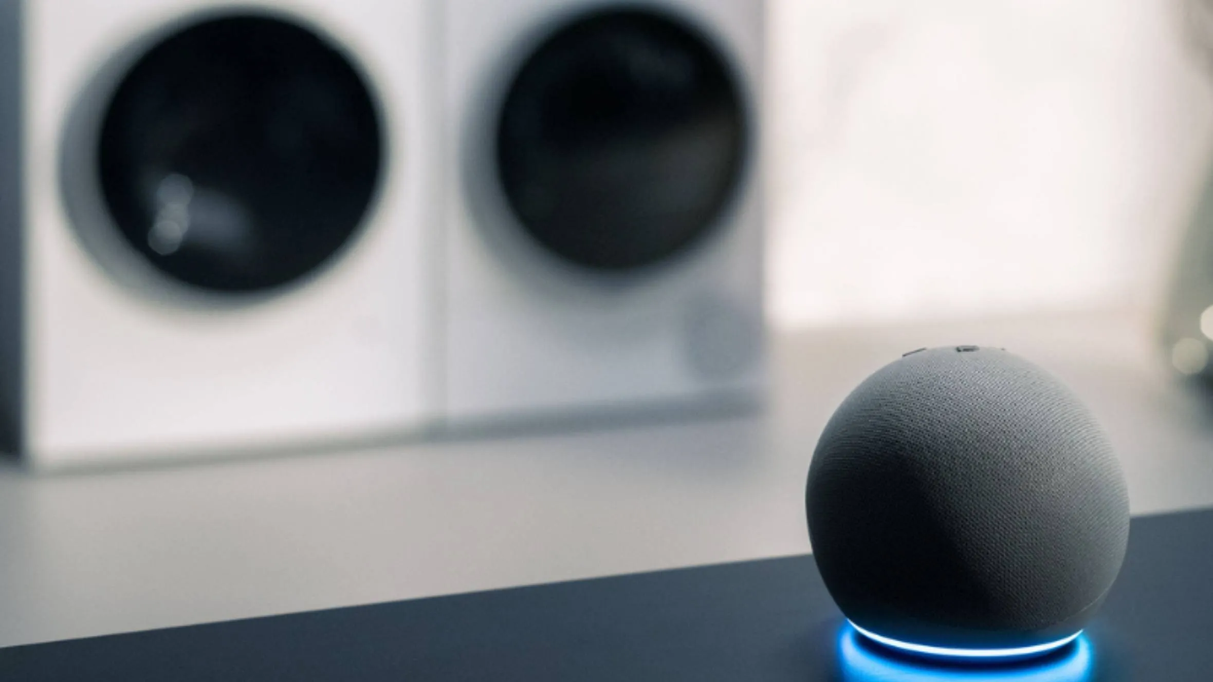 Smart home device on a table next to the washing machines
