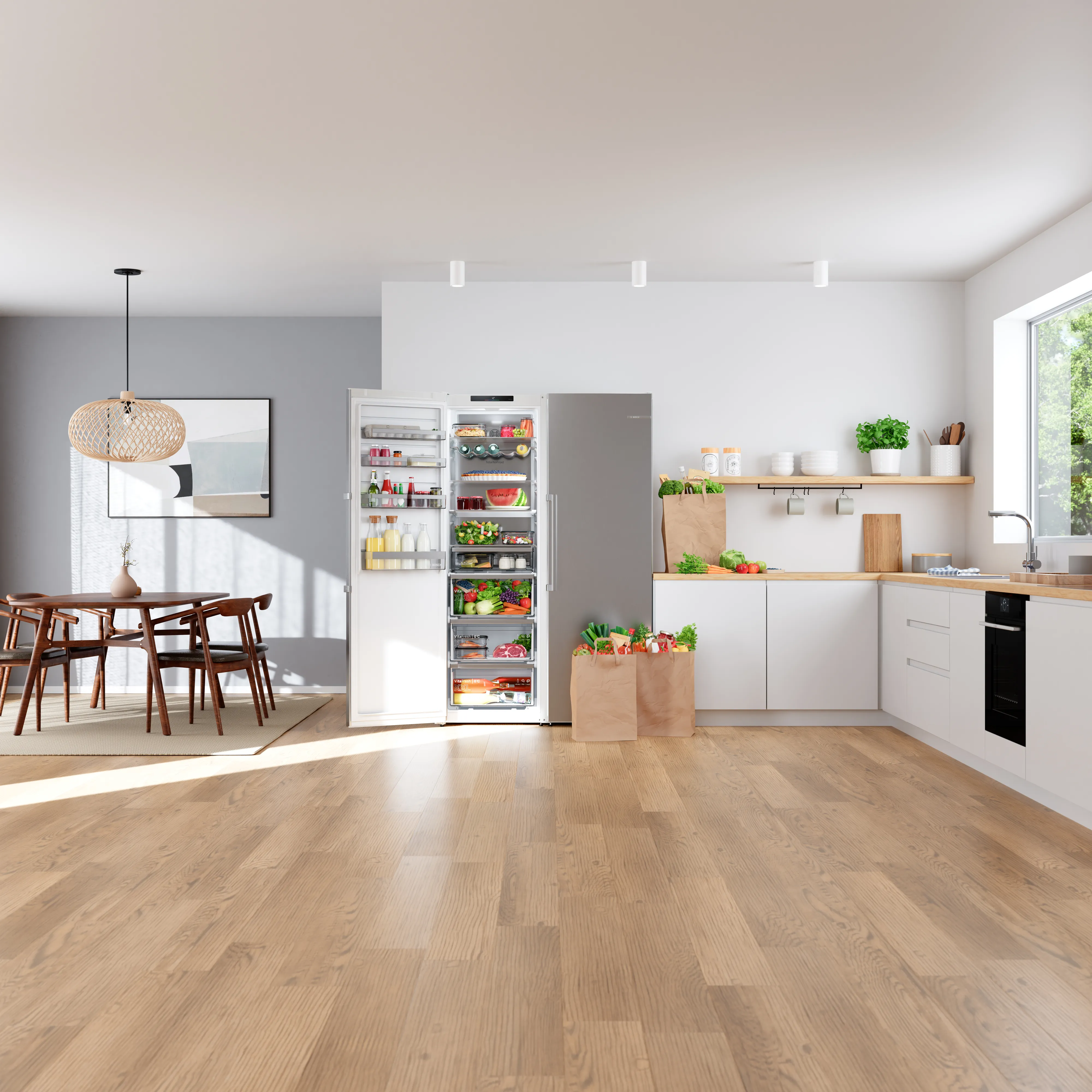 zilveren gevulde koelkast met deur open in keuken