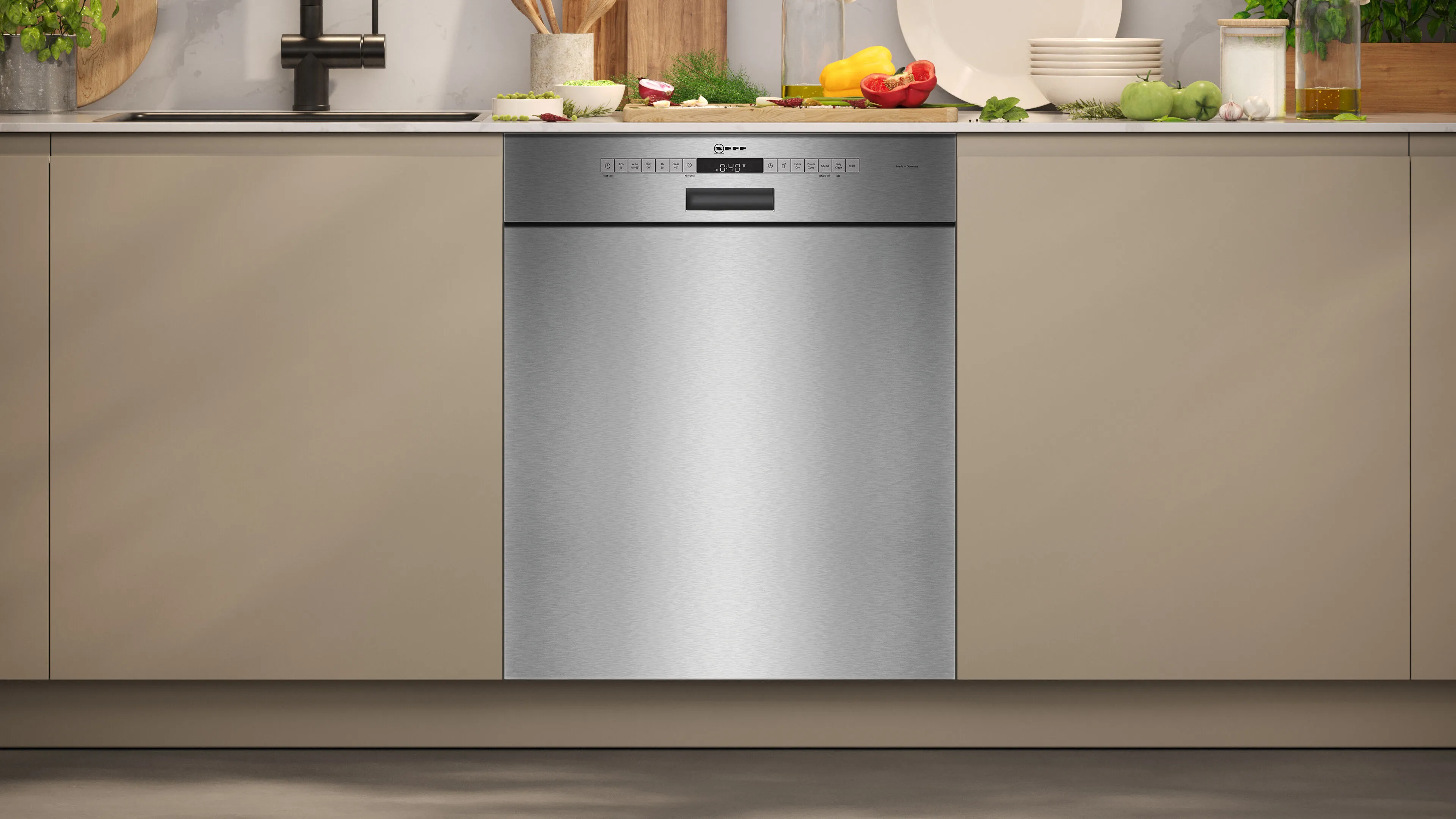 A built-under NEFF dishwasher under a counter.