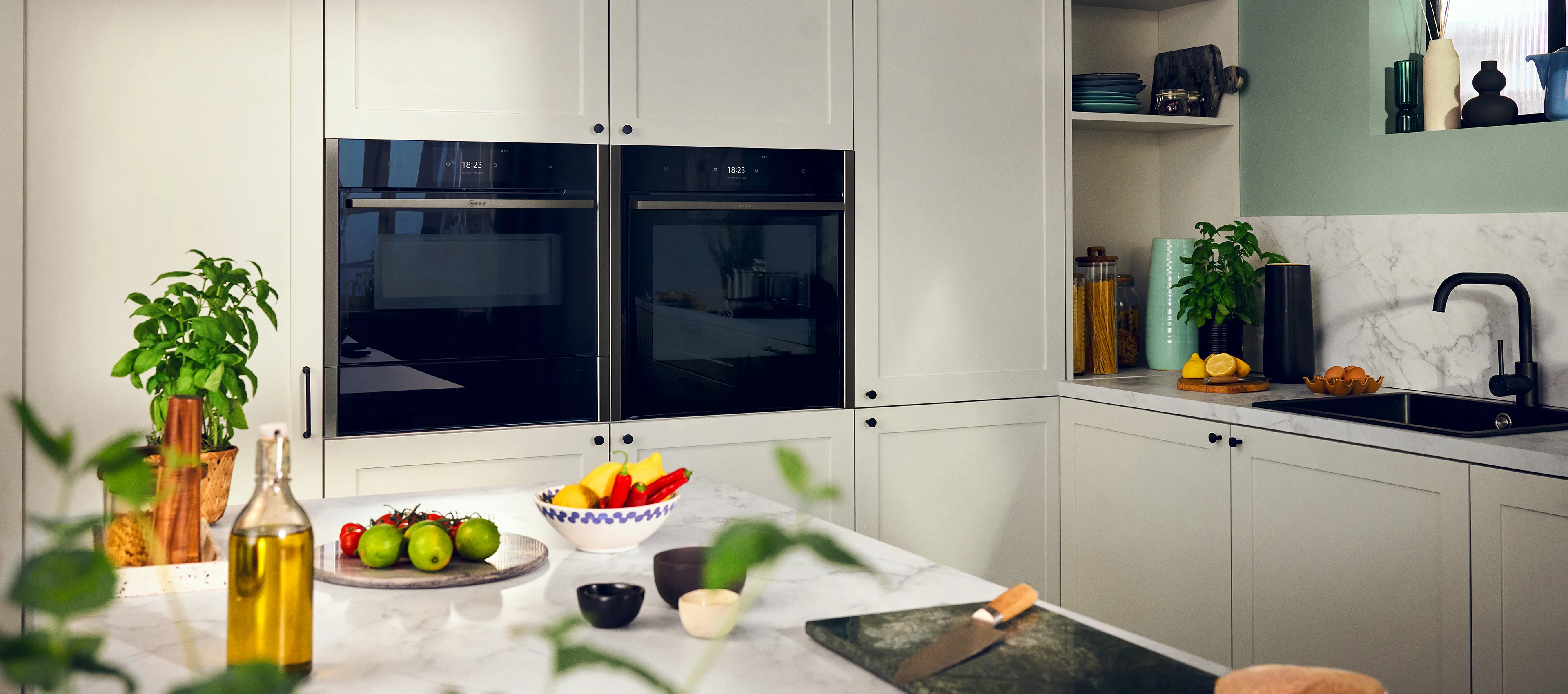 Bright and colourful kitchen with multiple NEFF appliances