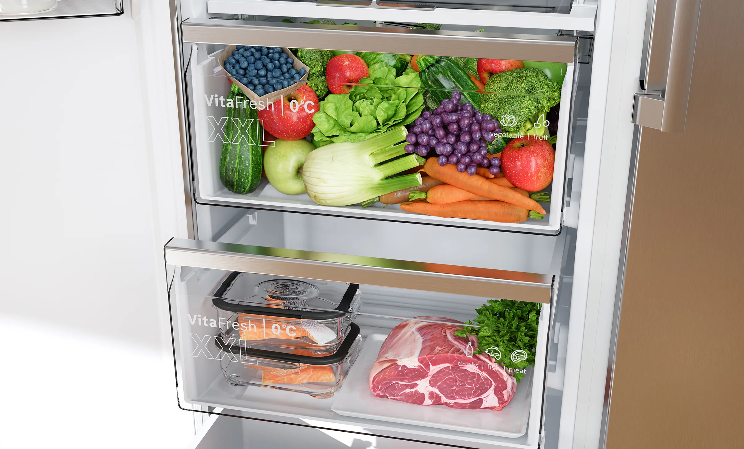 Το συρτάρι VitaFresh 0°C XXL είναι γεμάτο με φρέσκα προϊόντα τακτοποιημένα με τάξη, ενώ το συρτάρι από κάτω περιέχει ψυγμένο σολομό, κρέας και βότανα.