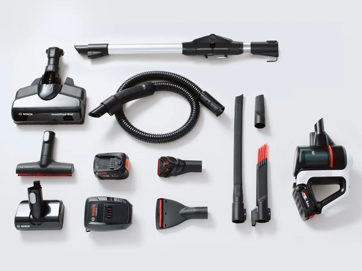Top view of many Bosch cordless vacuum cleaner accessories.