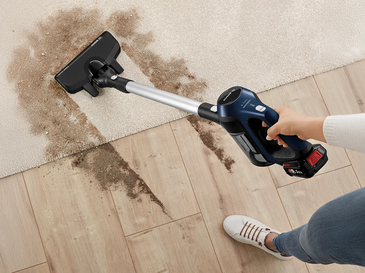 Unlimited 6 being used to clean dirty floor.