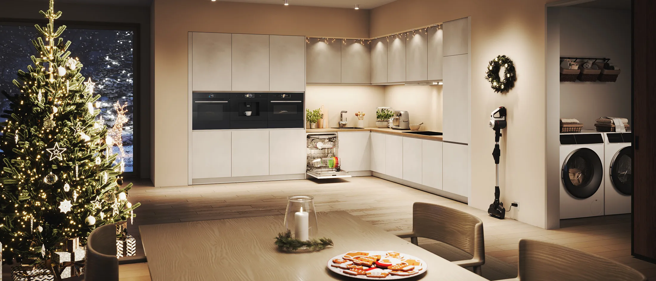 Moderna kuhinja u blagdanskom izdanju sa zagašenim ambijentalnim svjetlom.