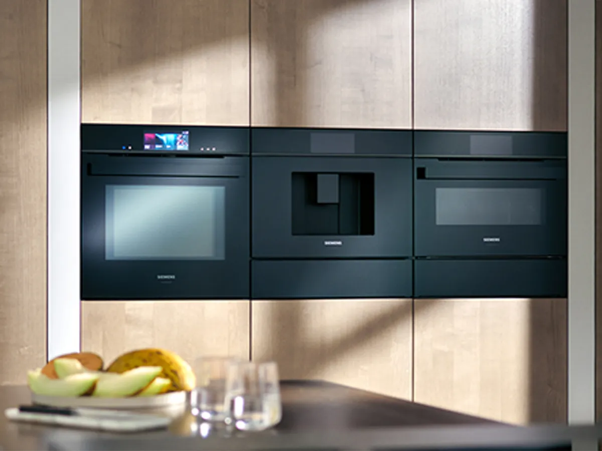 Siemens built-in appliances in light kitchen design 