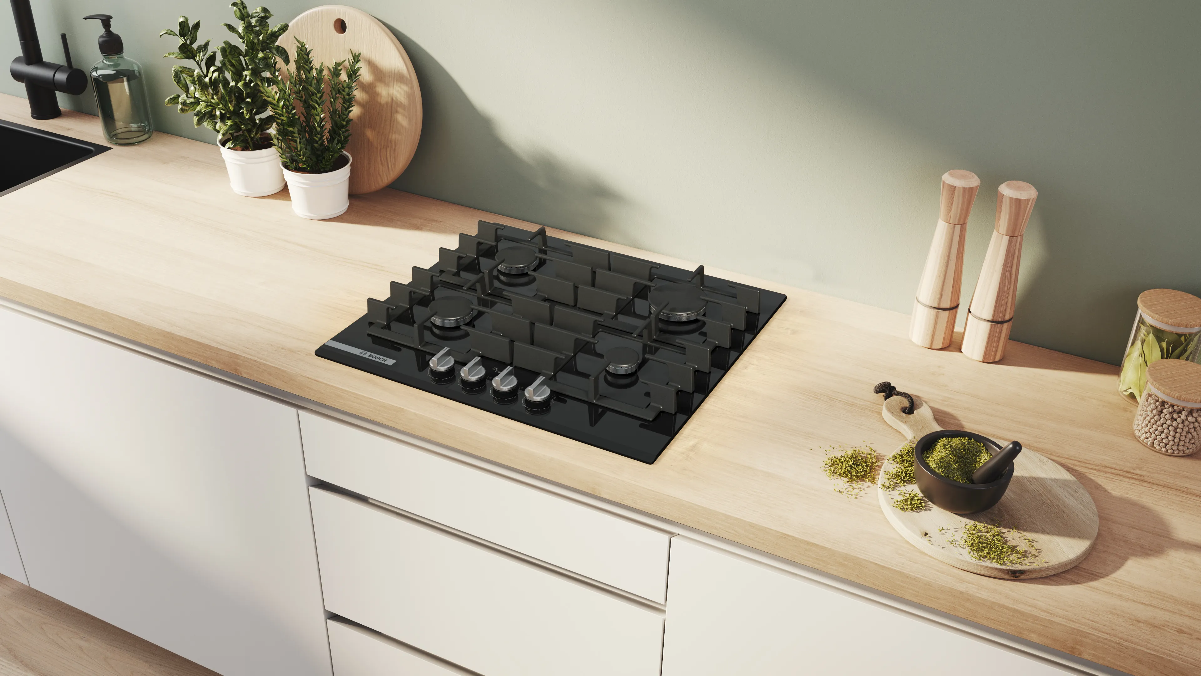 Moderne køkken med indbygget ovn, en slank brødrister og minimalistisk indretning med træskabe og hvide bordplader.