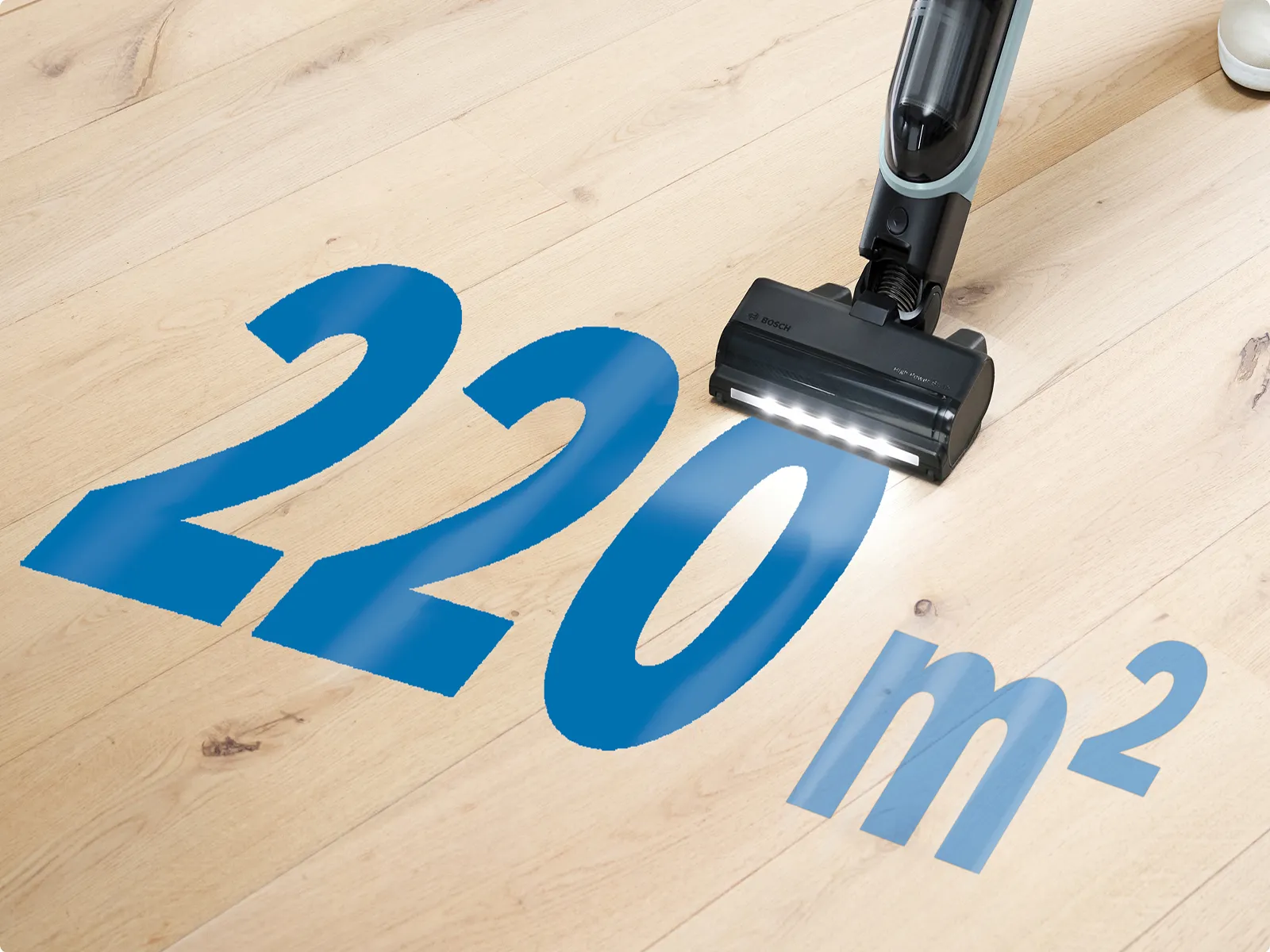 Прахосмукачка Flexxo Серия 4 със светодиоди на светъл дървен под; подчертава се покритие от 220 м².