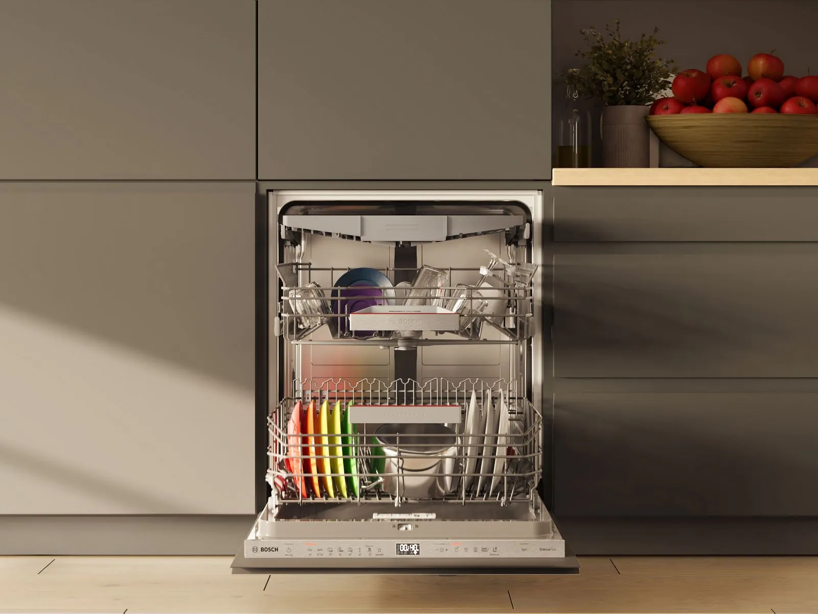 Un rincón de cocina moderna con un lavavajillas Bosch, un fregadero minimalista y un libro de cocina.