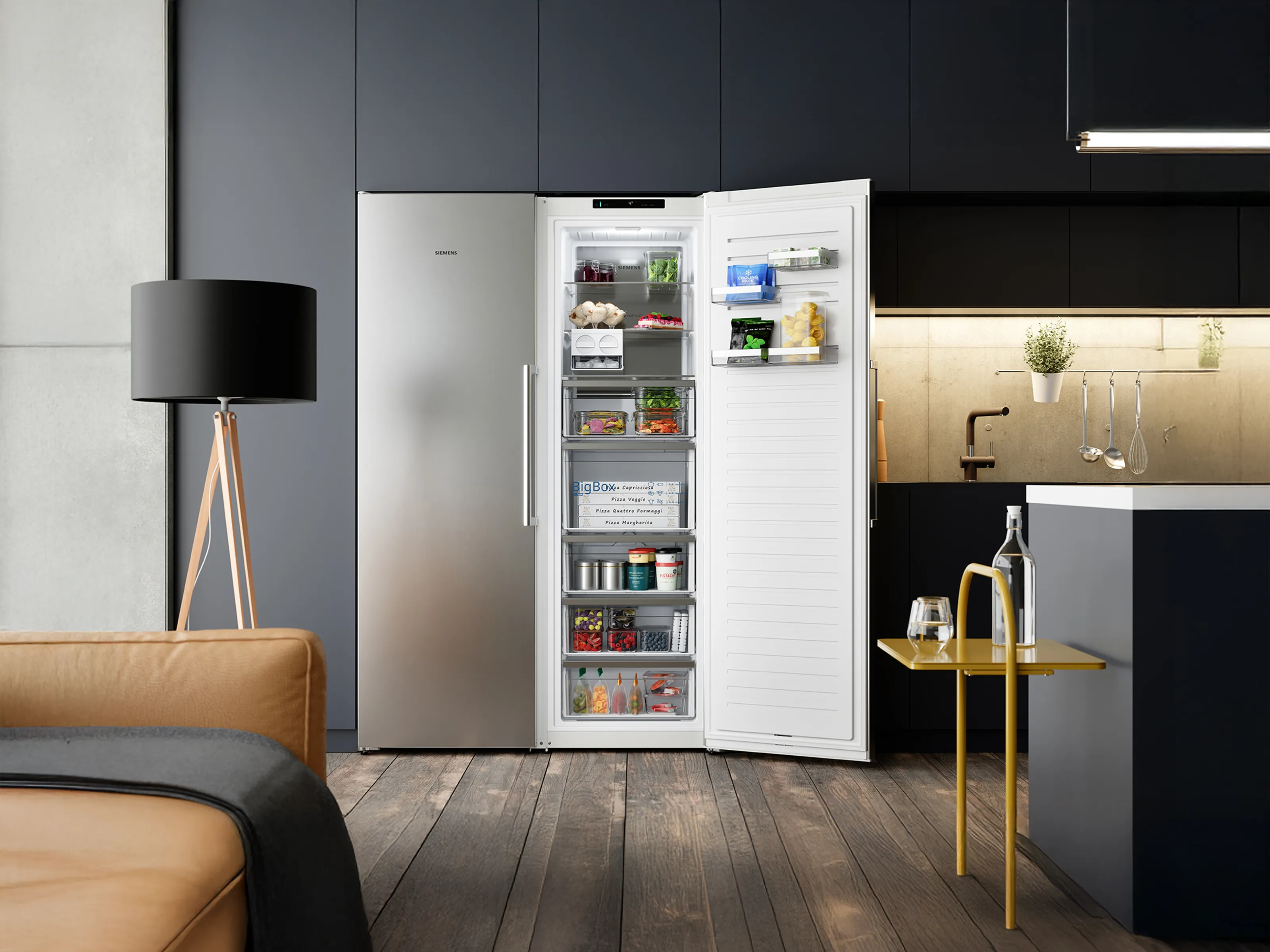 Congelador diseñado por Siemens abierto en una cocina moderna, mostrando cajones organizados y el almacenamiento BigBox.