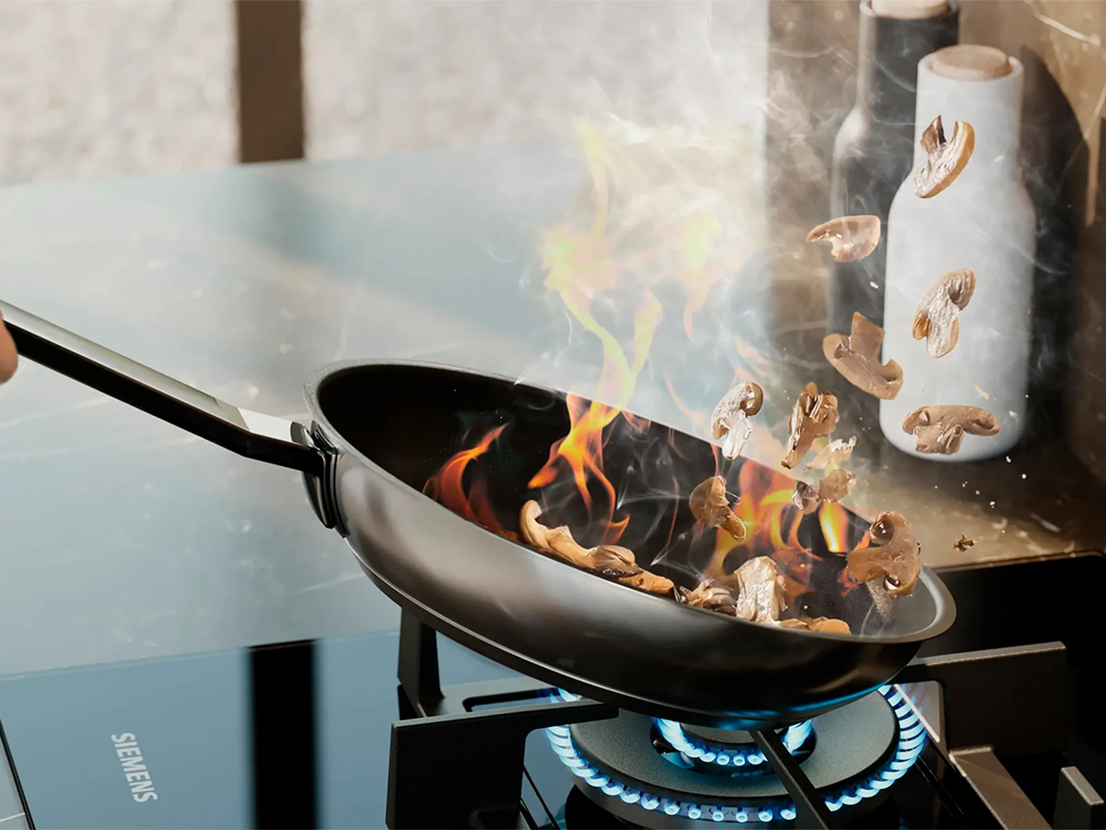 Gas hob with stepFlame