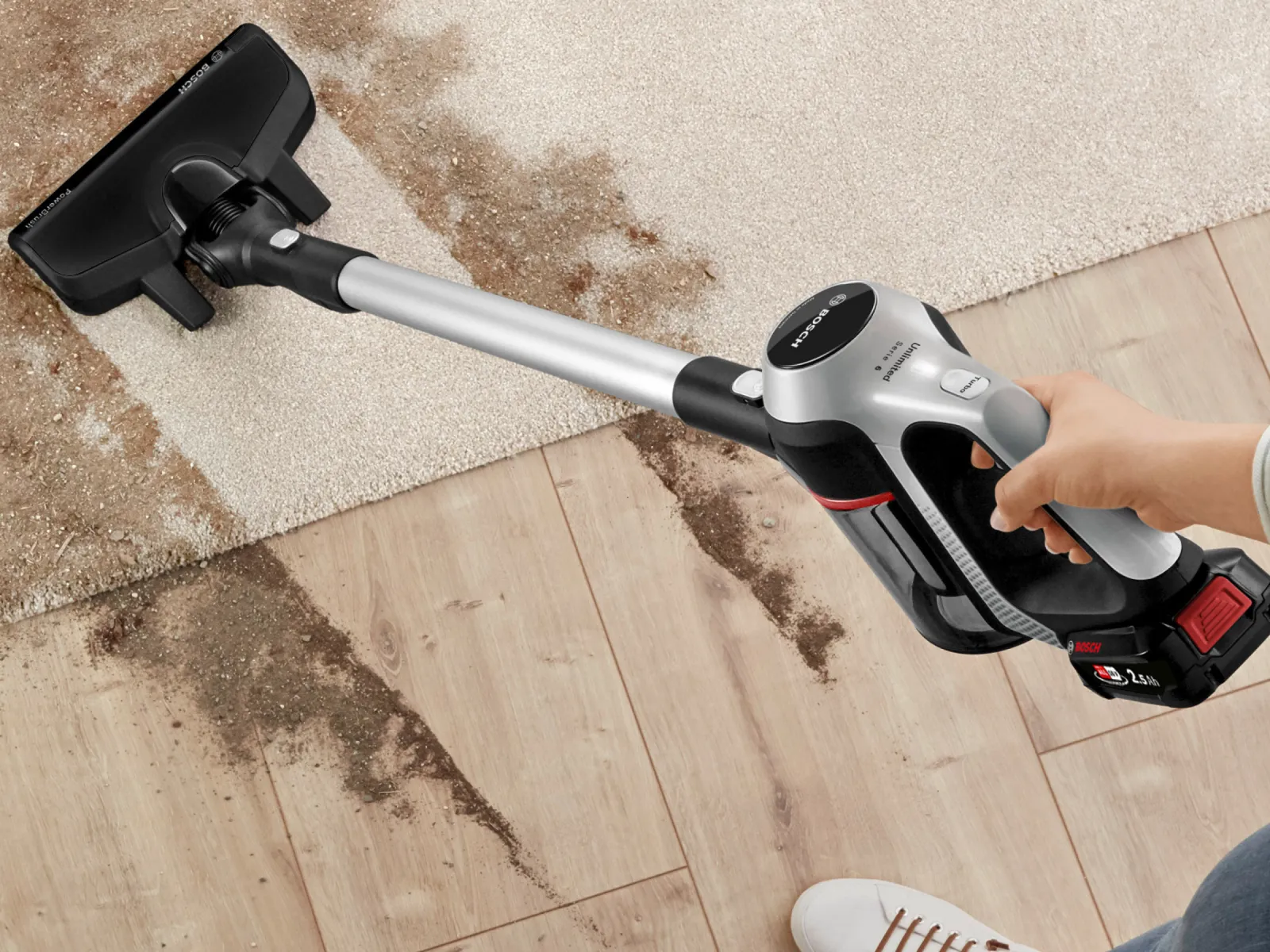 Cordless vacuum cleaner with lightweight power and attachments for cleaning hard floors and carpets.