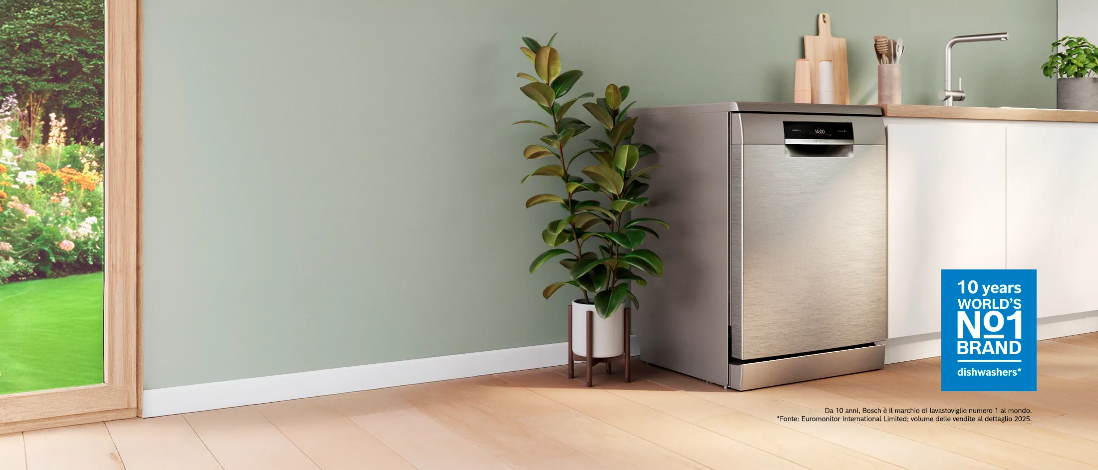 Cucina moderna con una lavastoviglie elegante, un piano di lavoro in legno e armadietti bianchi.