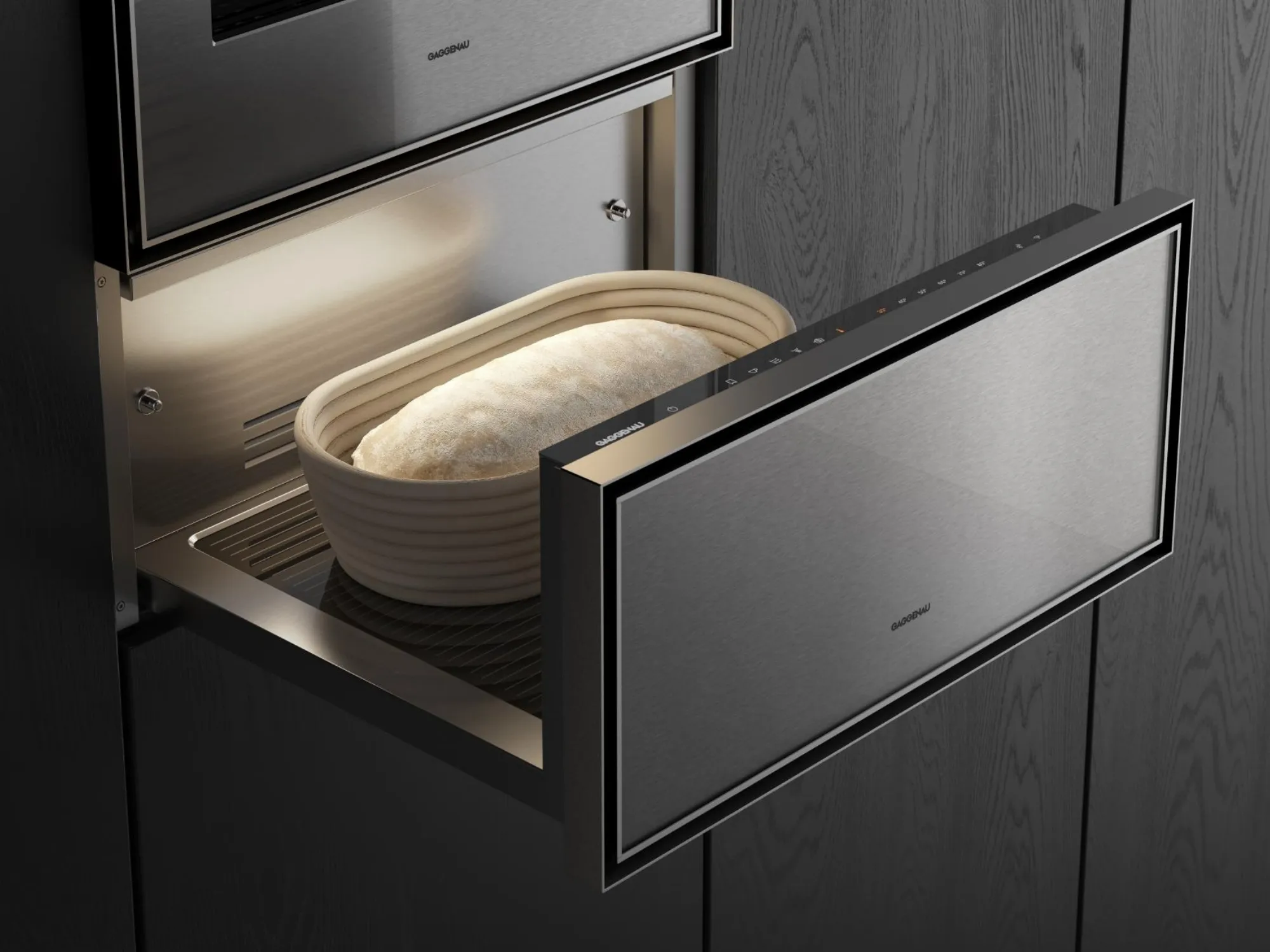 Close-up of an open Gaggenau Expressive series culinary warming drawer