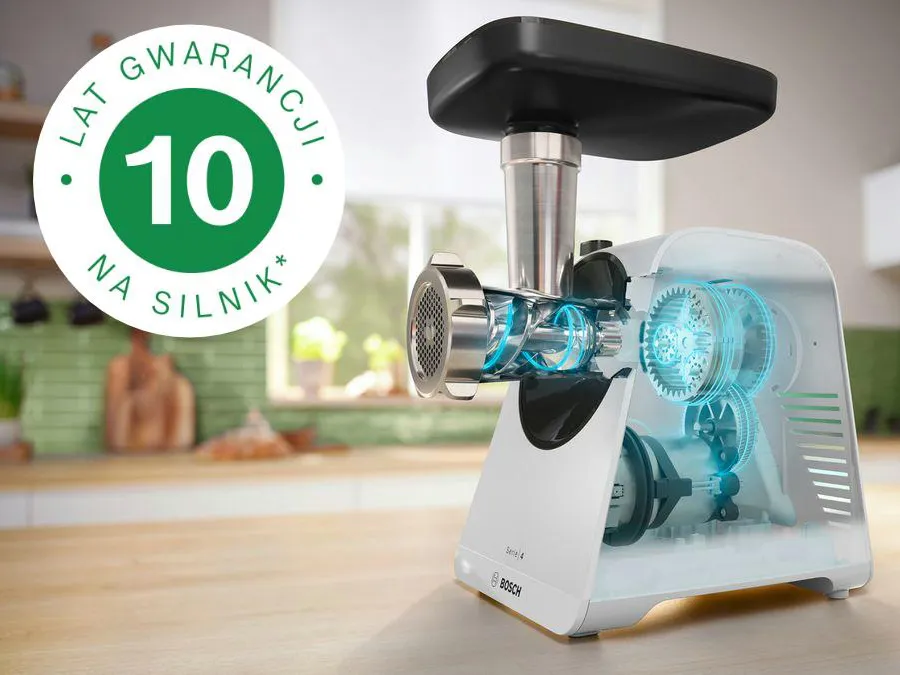 Elektryczny młynek do mięsa z 10-letnią gwarancją na drewniany licznik kuchni.
