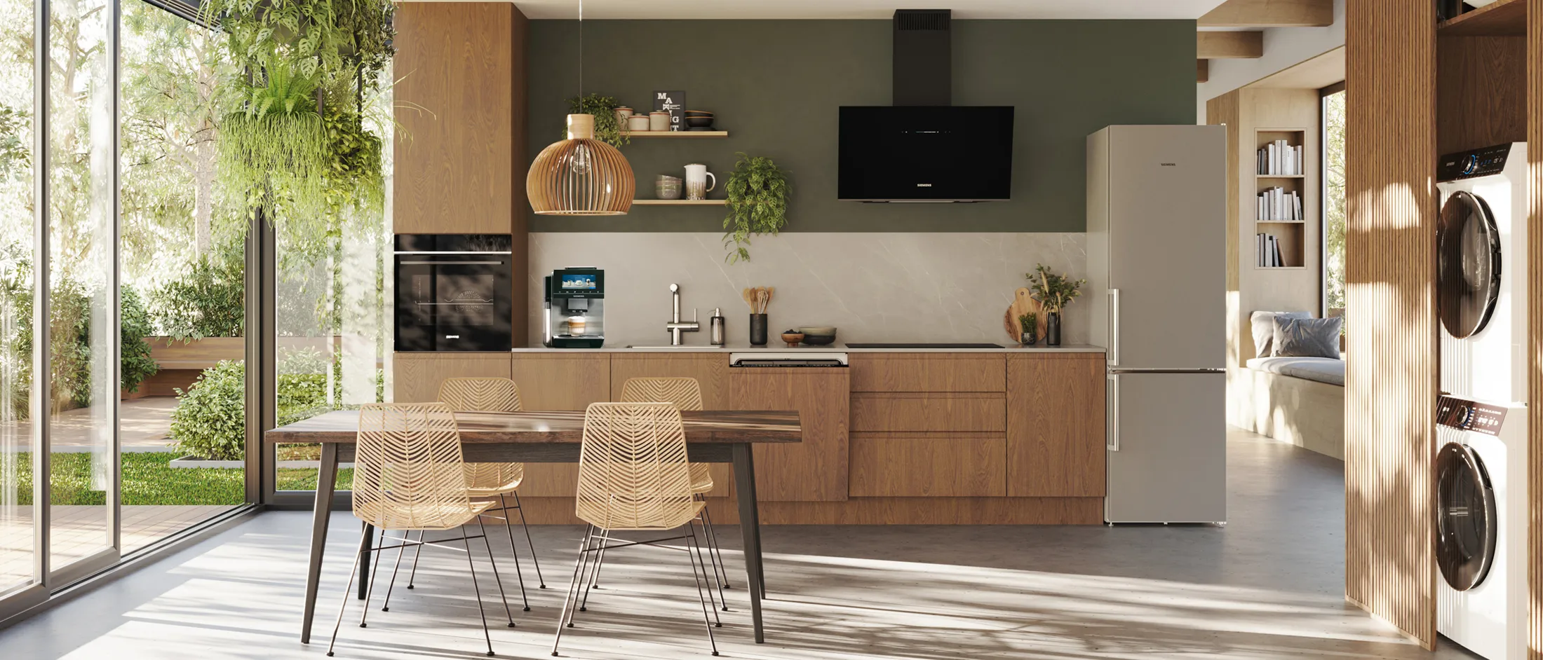 Grüner Raum mit vielen Pflanzen und Siemens Hausgeräten und dem Hinweis auf die aktuelle Aktion „Rundum-sorglos-Aktion“ im Siemens Online Shop