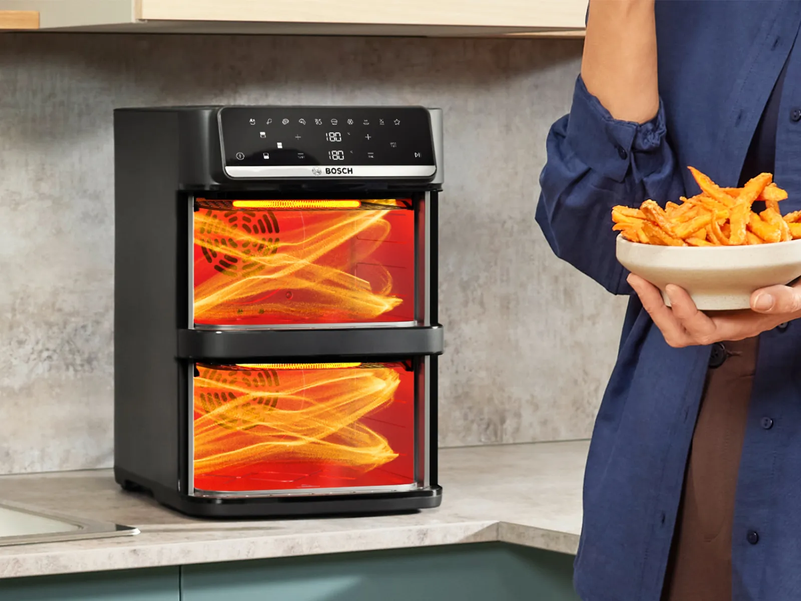 On a kitchen counter the Series 6 Double Stack Drawer shows its advanced heating technology inside
