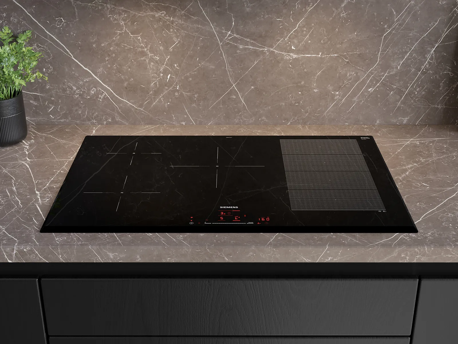 A black Siemens induction cooktop with flexible cooking zones and red digital controls, integrated into a dark marble-patterned countertop in a modern kitchen.