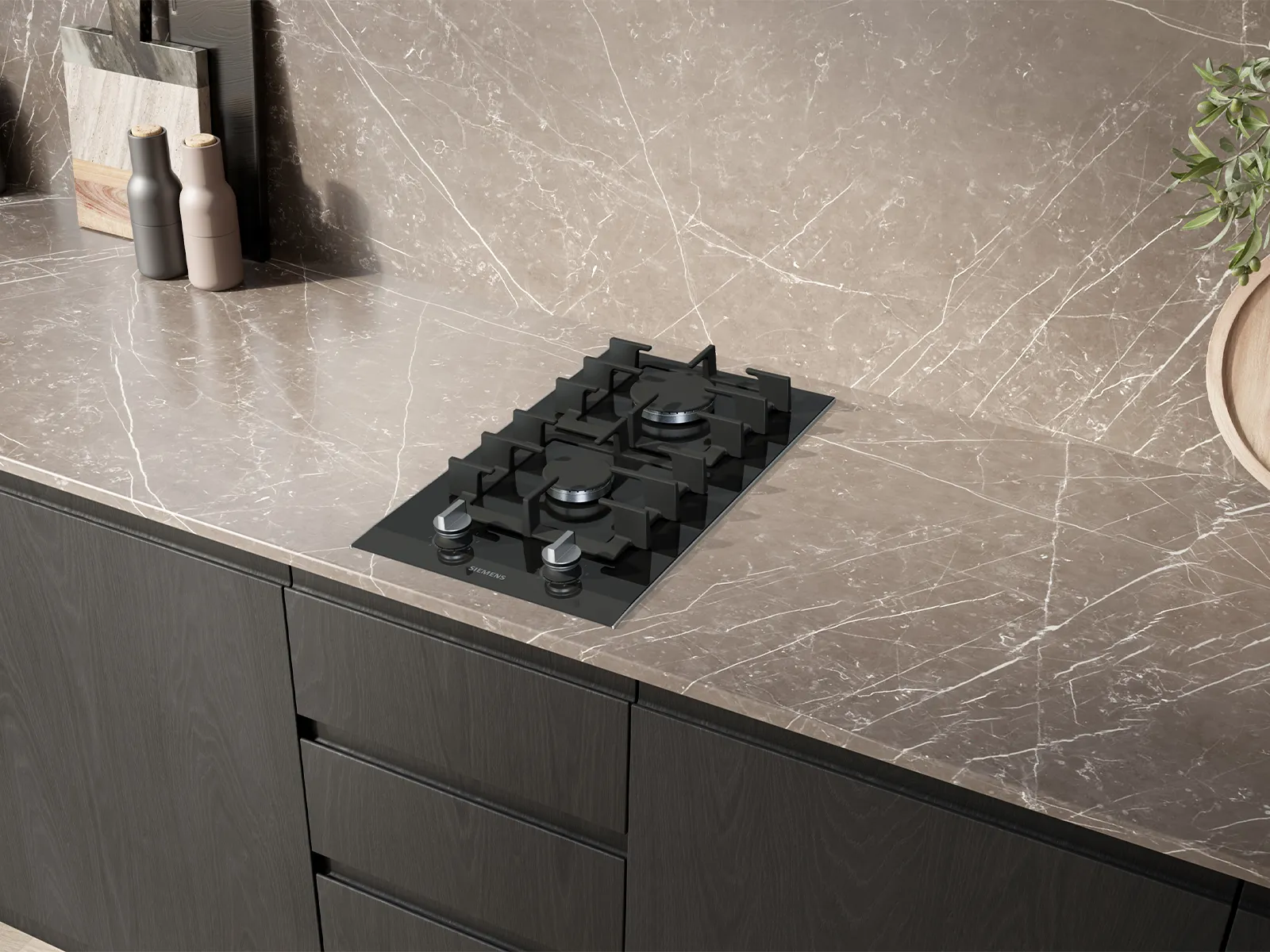 Black induction cooktop on wooden surface.