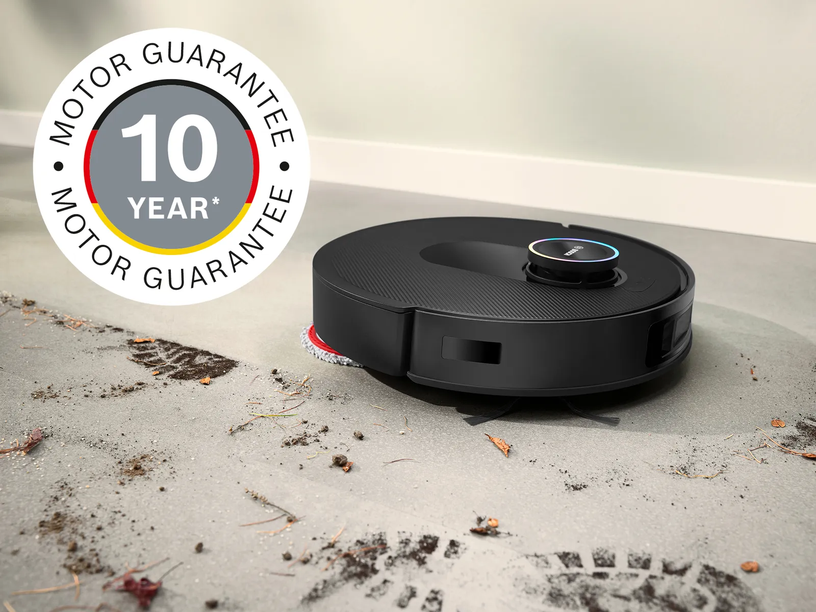 Spotless rengör lera från vita plattor, med ett 10-års motor garantitavla i det övre vänstra hörnet.