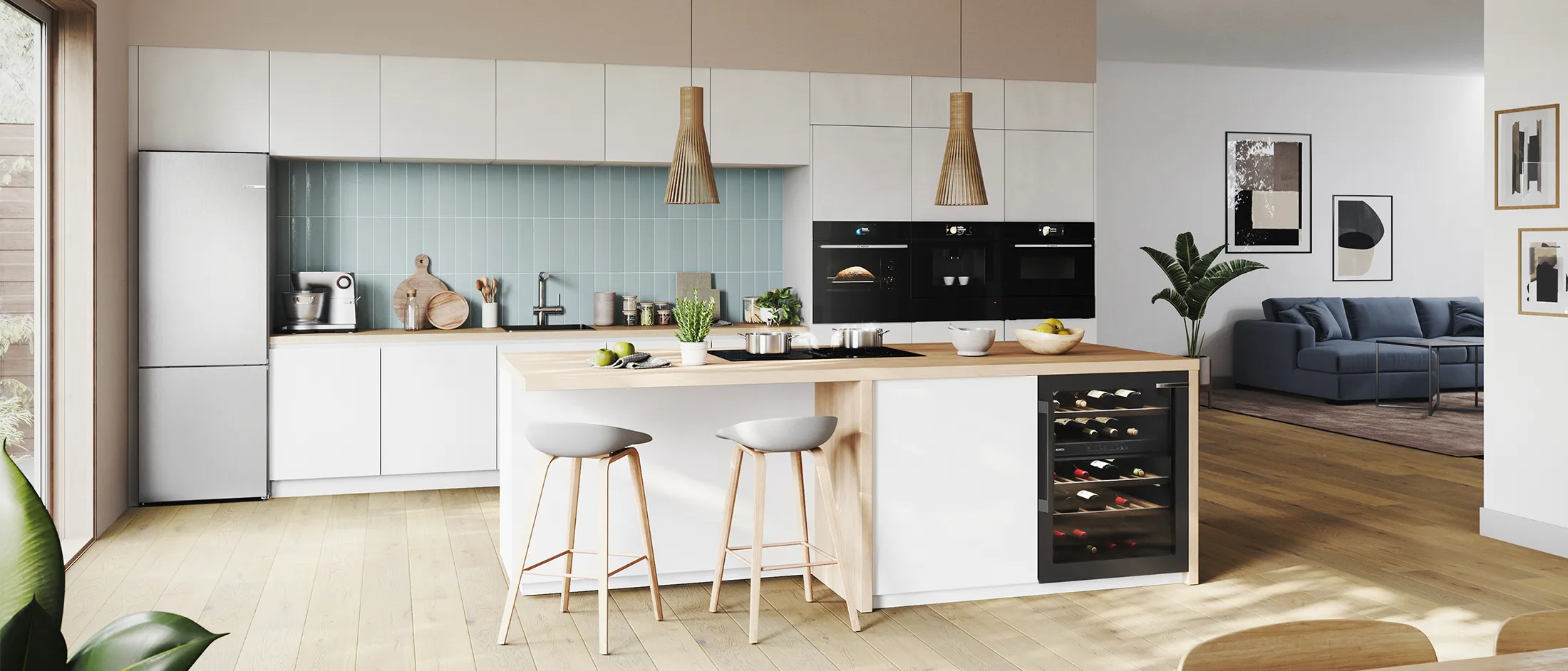 Cucina moderna caratterizzata da mobili eleganti, un'isola centrale con sgabelli da bar e un refrigeratore per vino, collegato a un'accogliente zona giorno.