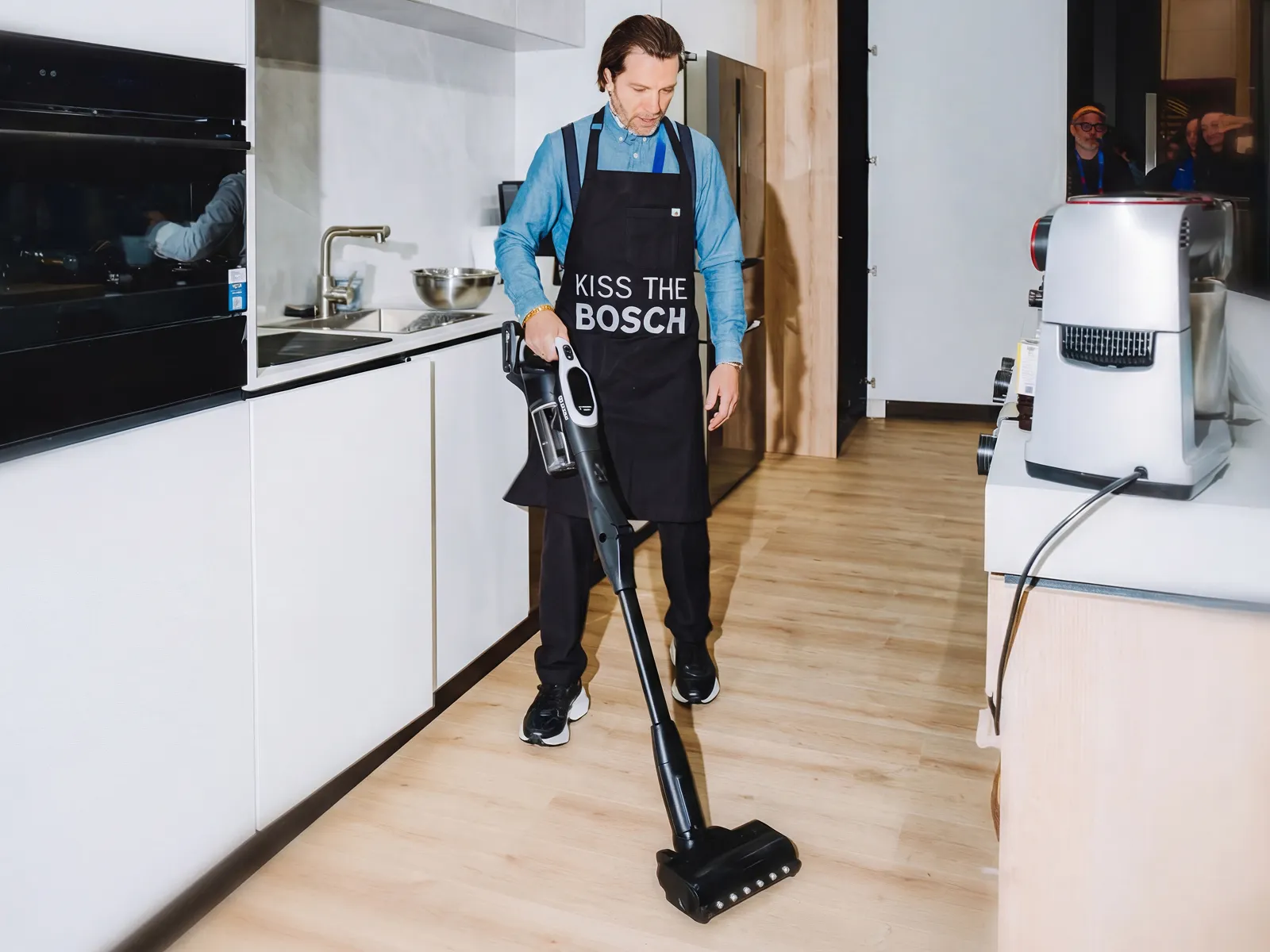 Chef Marcel using Bosch Cordless Vacuum Cleaner after cooking up a storm